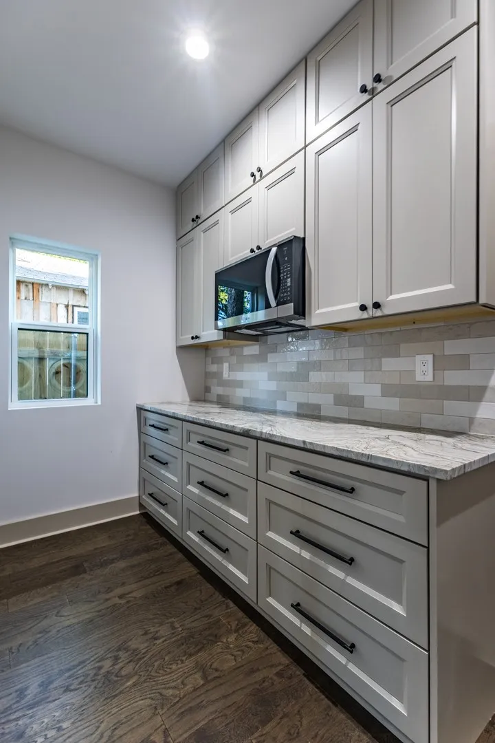 Expansive built-in cabinetry In the walk in pantry