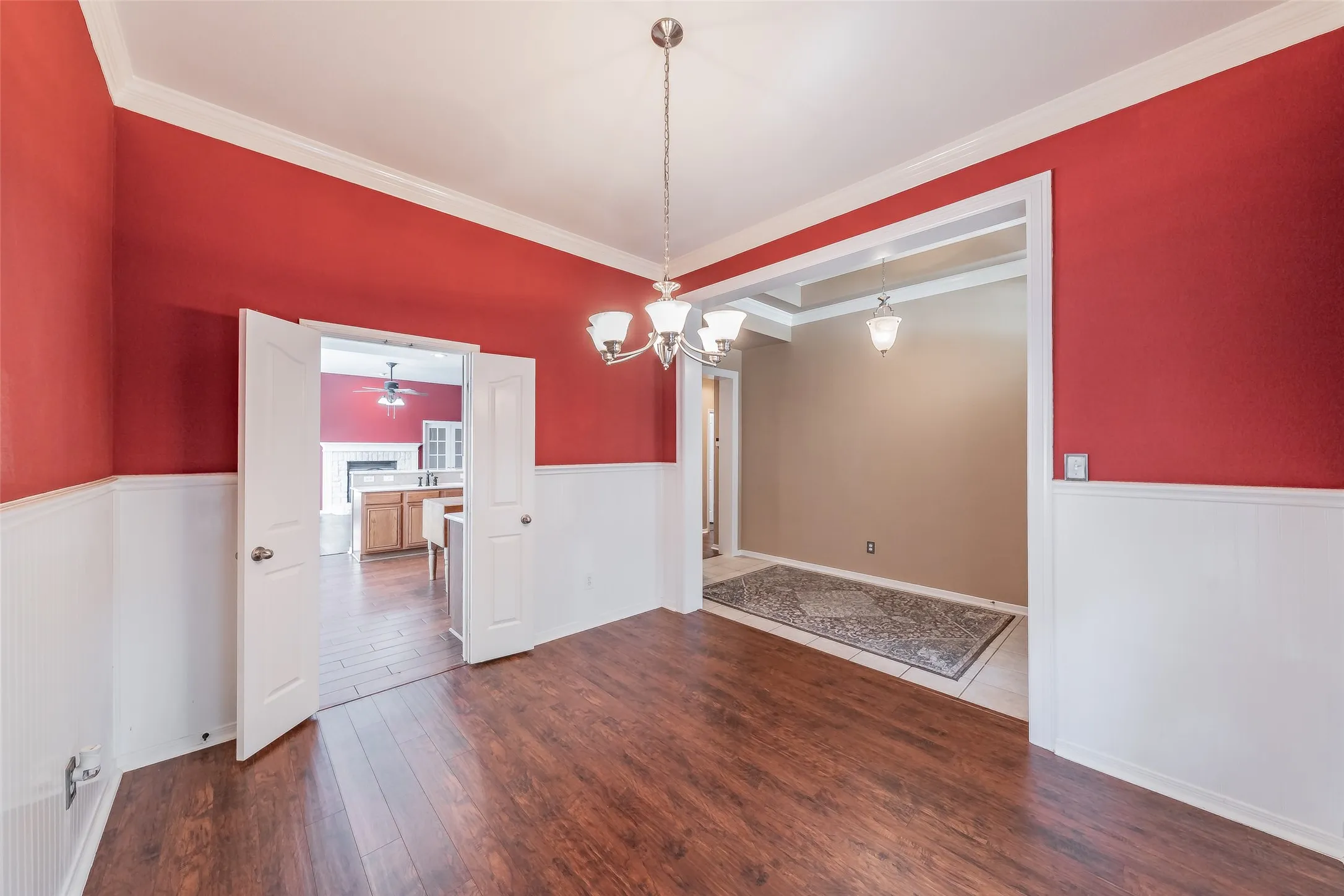 Light-filled formal dining room near the entry, offering flexible space for meals and entertaining.