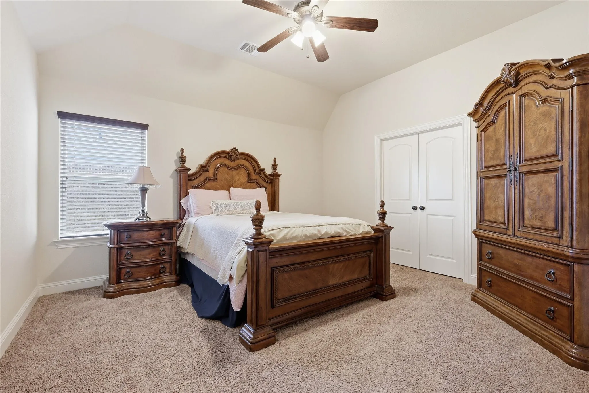 Downstairs bedroom with generous walk in closet.