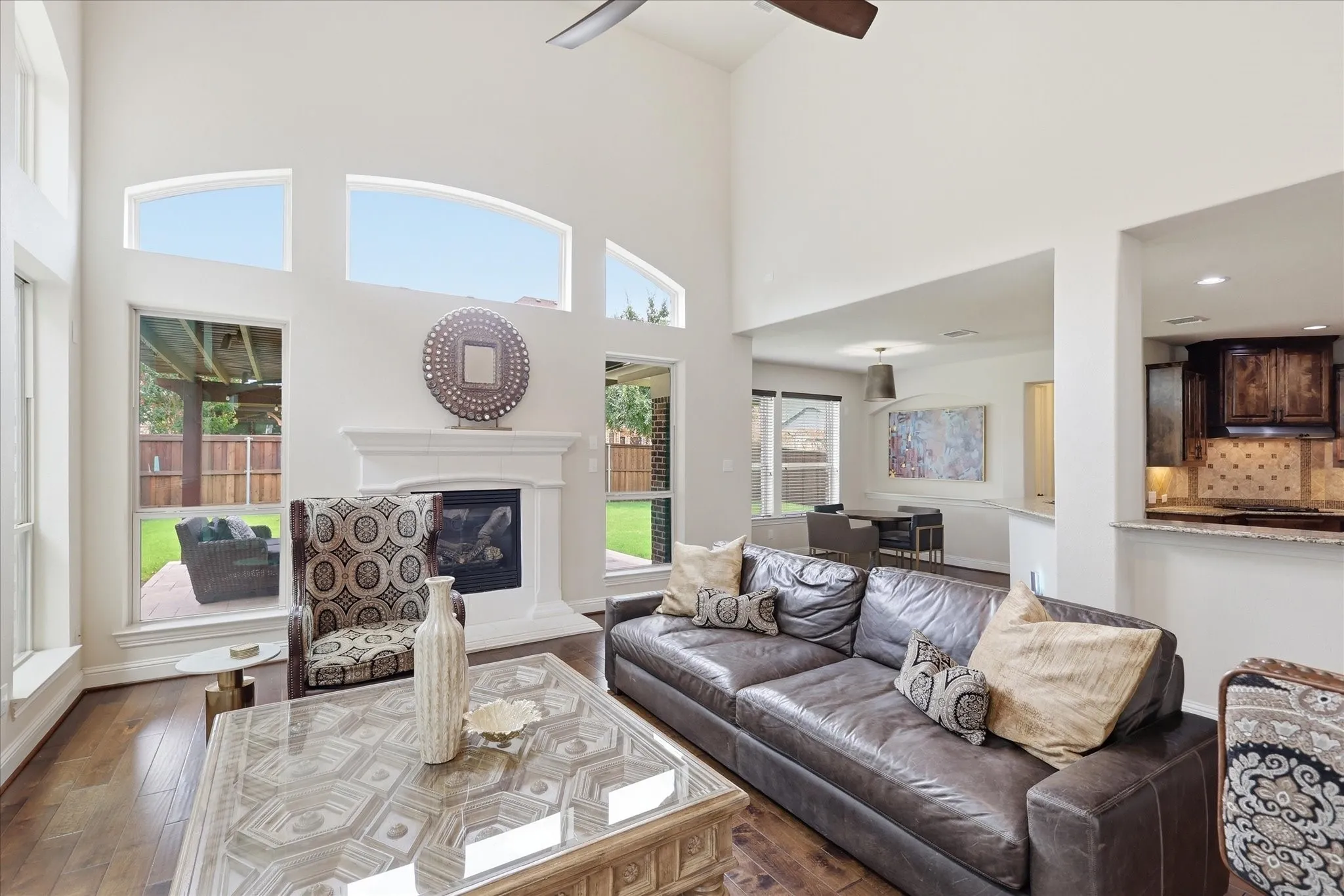 Inviting layout makes this the perfect gathering space, with backyard views adding to the appeal.