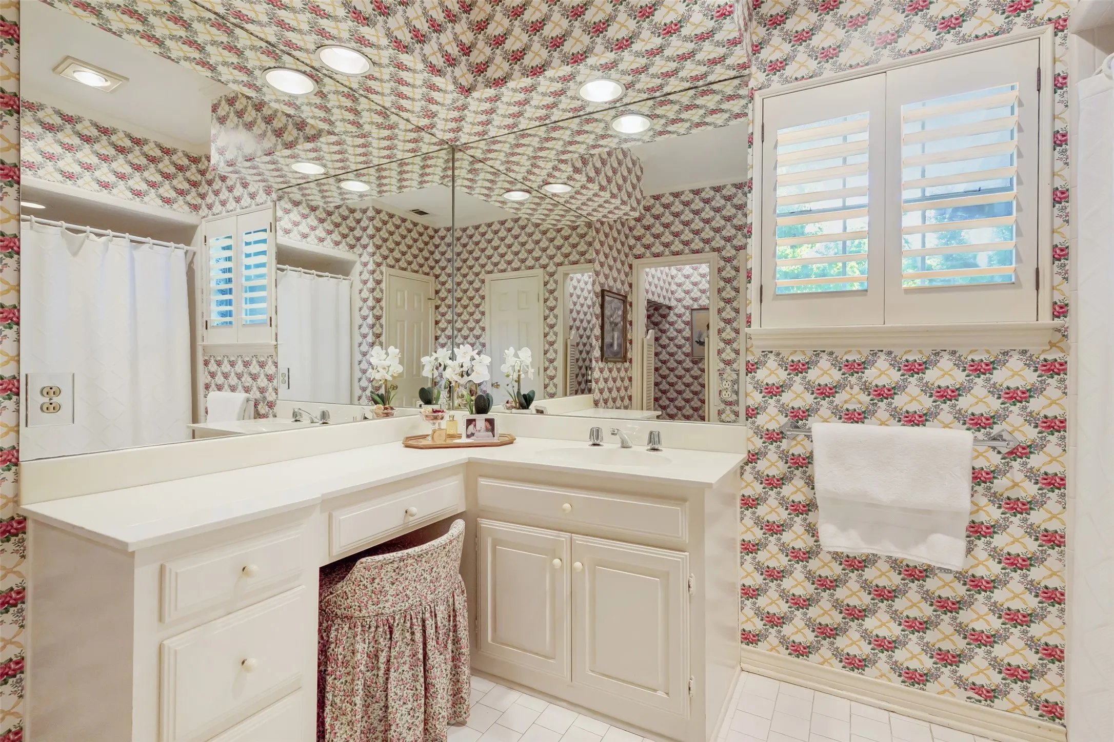 Upstairs ensuite bath features lots of storage and counter space