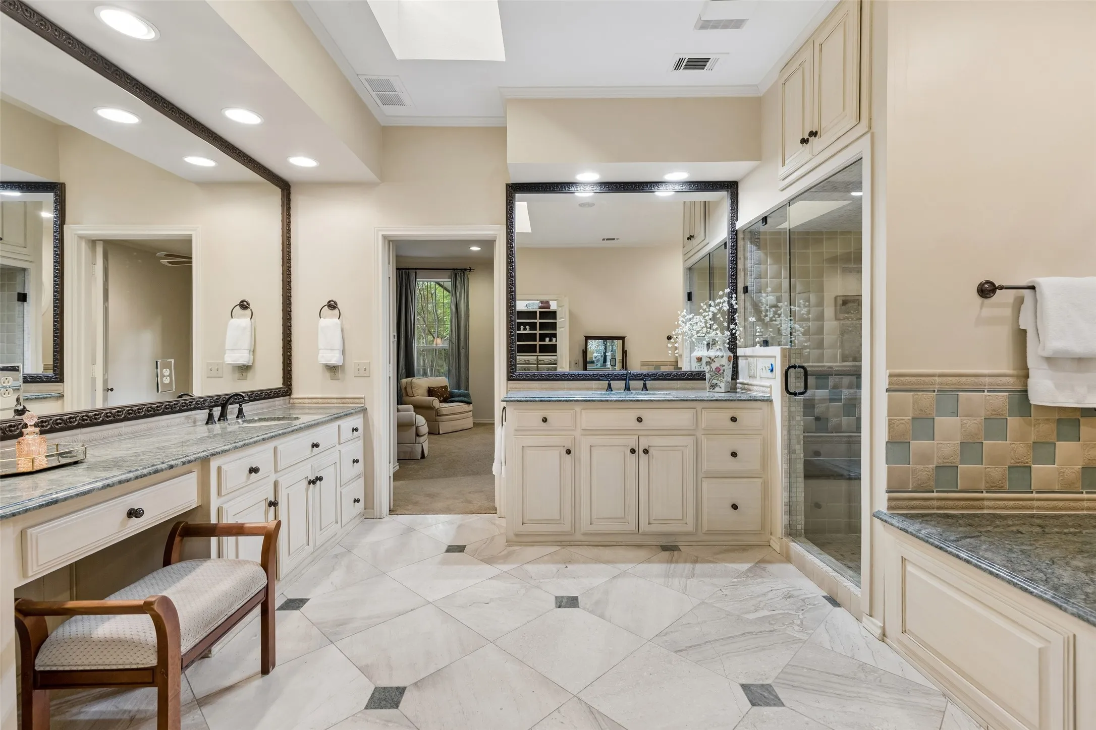 Granite countertops, recessed lighting, lots of storage, separate shower, jetted tub for relaxation.