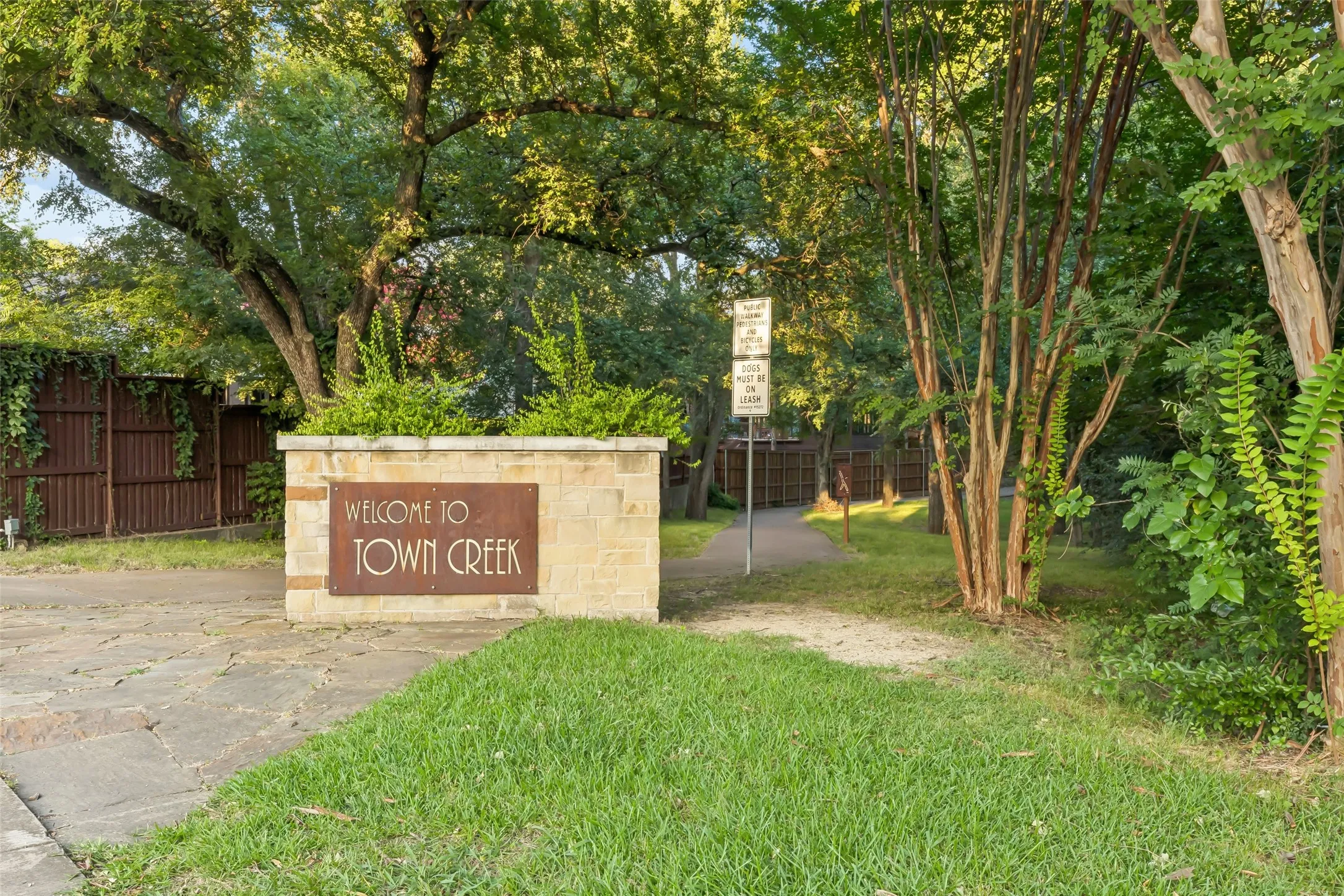 COUNTRY IN THE CITY!  Meet your friendly neighbors while enjoying the pastoral beauty of almost 2 miles of paved Creek paths, maintained by the City.