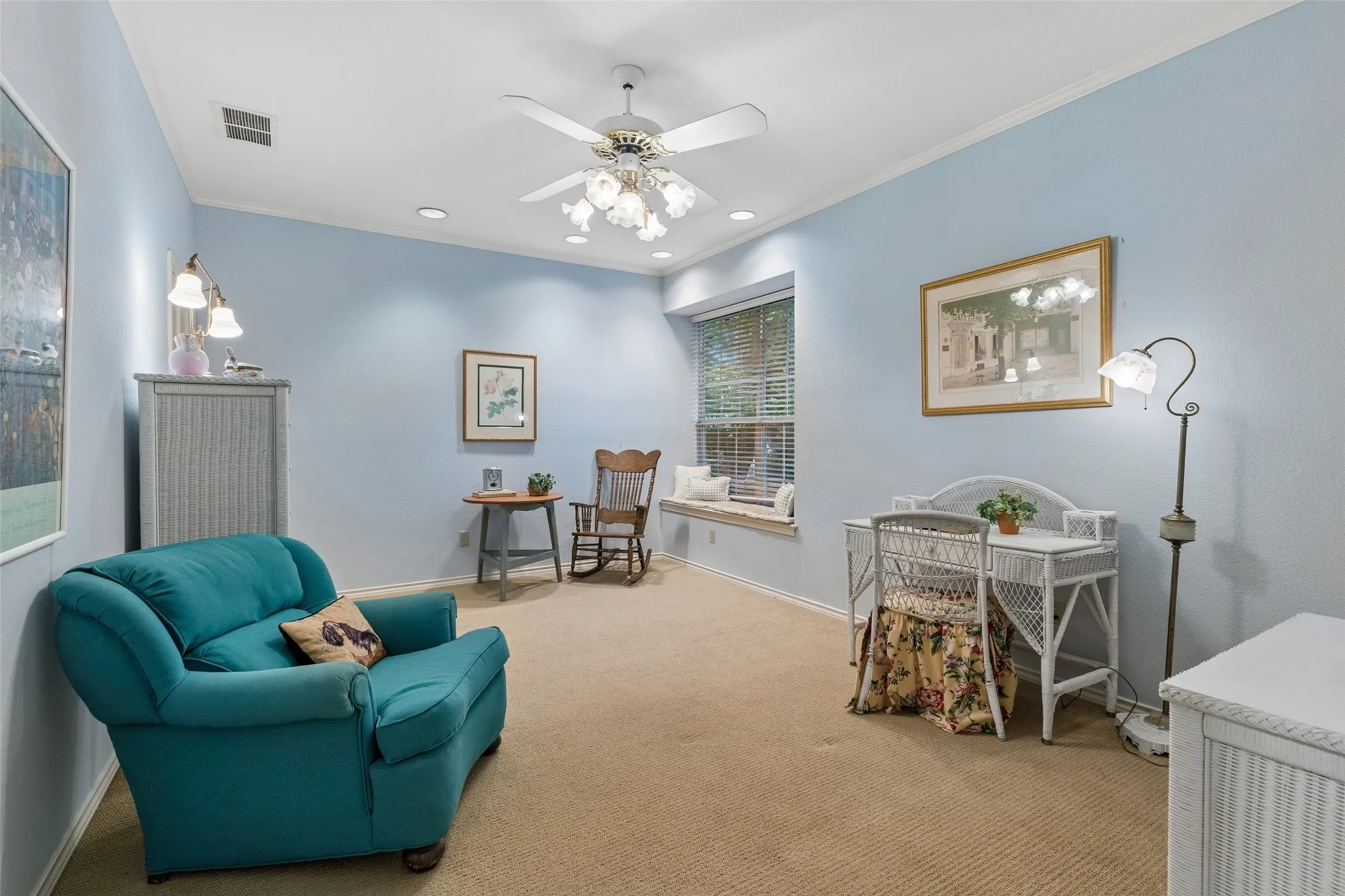 Upstairs bedroom with ensuite bath featuring lots of counter space.  Enjoy the large, walk-in closet.  Wonderful view of lush backyard from window seat.