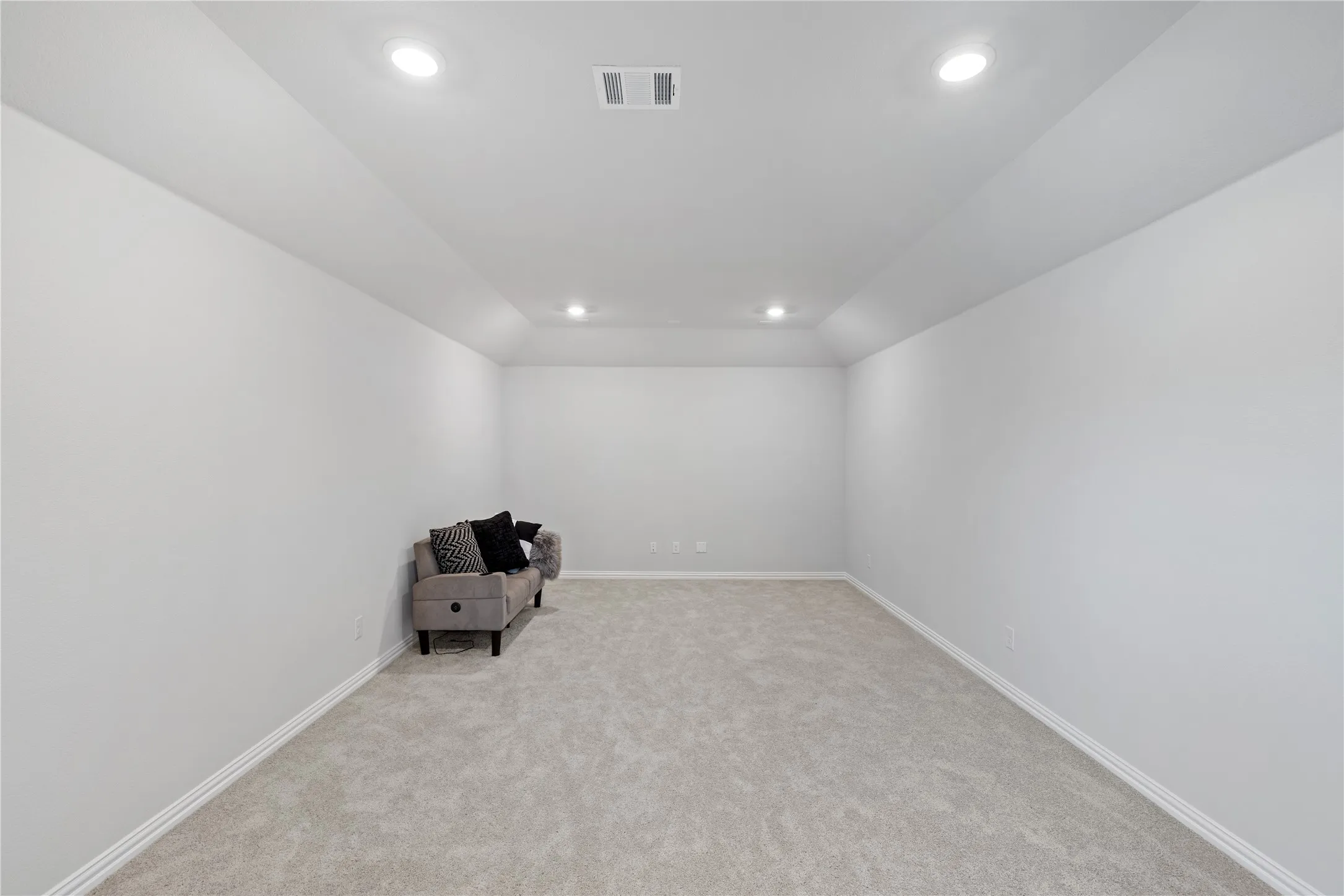 Dedicated media room offering the perfect space for a home theater, game-day watch parties, movie nights, or gaming. The generous dimensions provide endless flexibility for theater seating, a projector, surround sound, or a custom entertainment setup.
