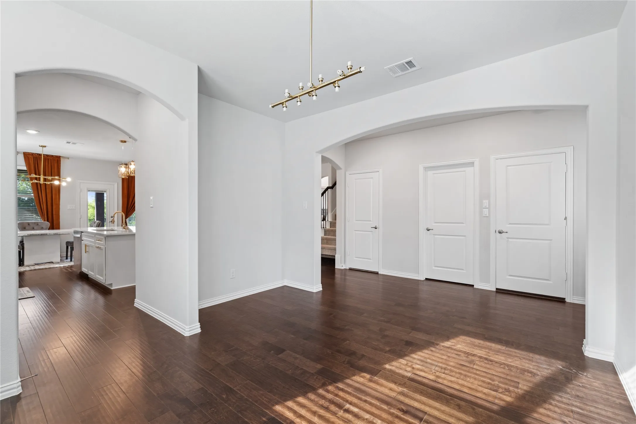 Open dining area seamlessly connecting to the kitchen, offering effortless entertaining and an ideal layout for family dinners, celebrations, and everyday living.