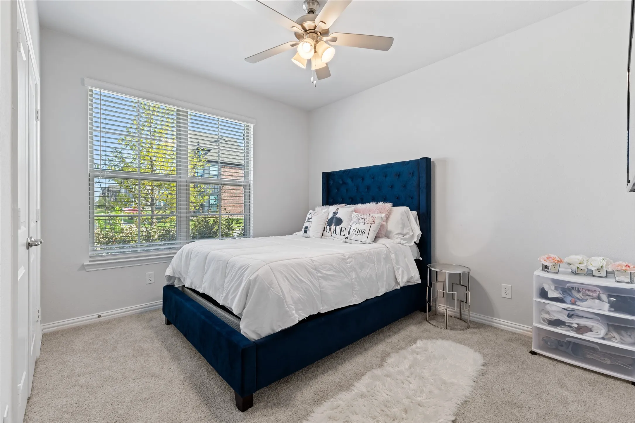 Private first-floor guest/ in law bedroom perfect for multigenerational living, an in-law suite, visiting guests, or a private home office with abundant natural light and easy access to a full bathroom.