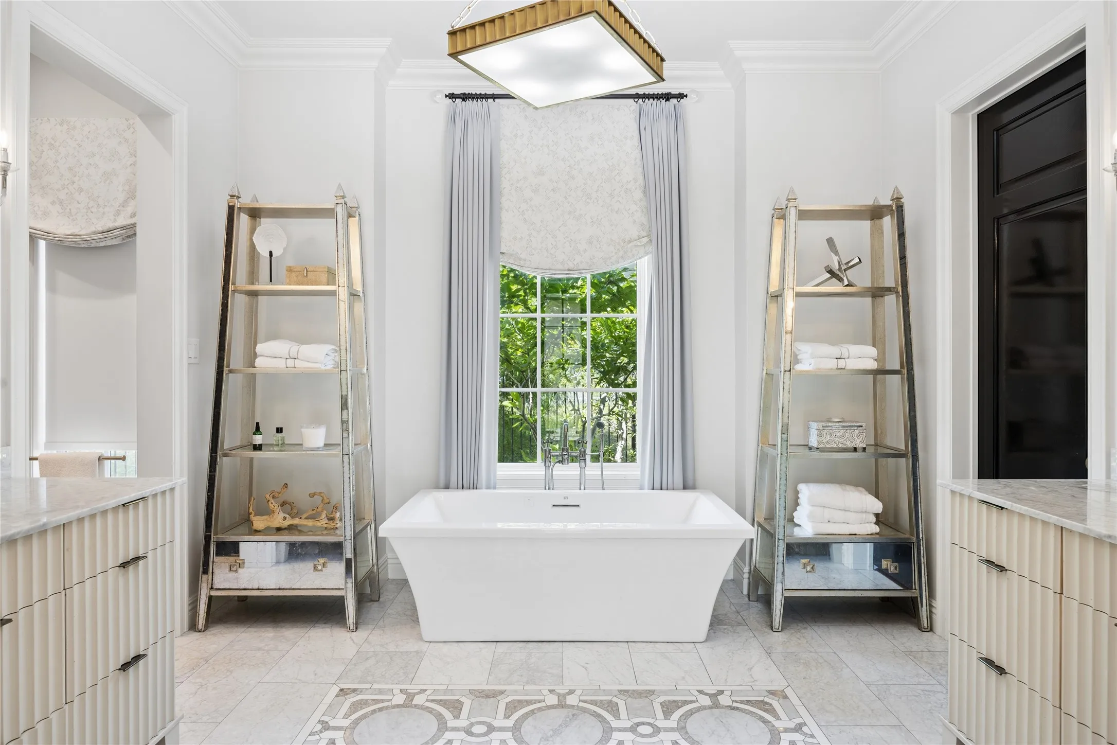 Gorgeous Primary Bath Suite with Carrara a Marble floors and countertops