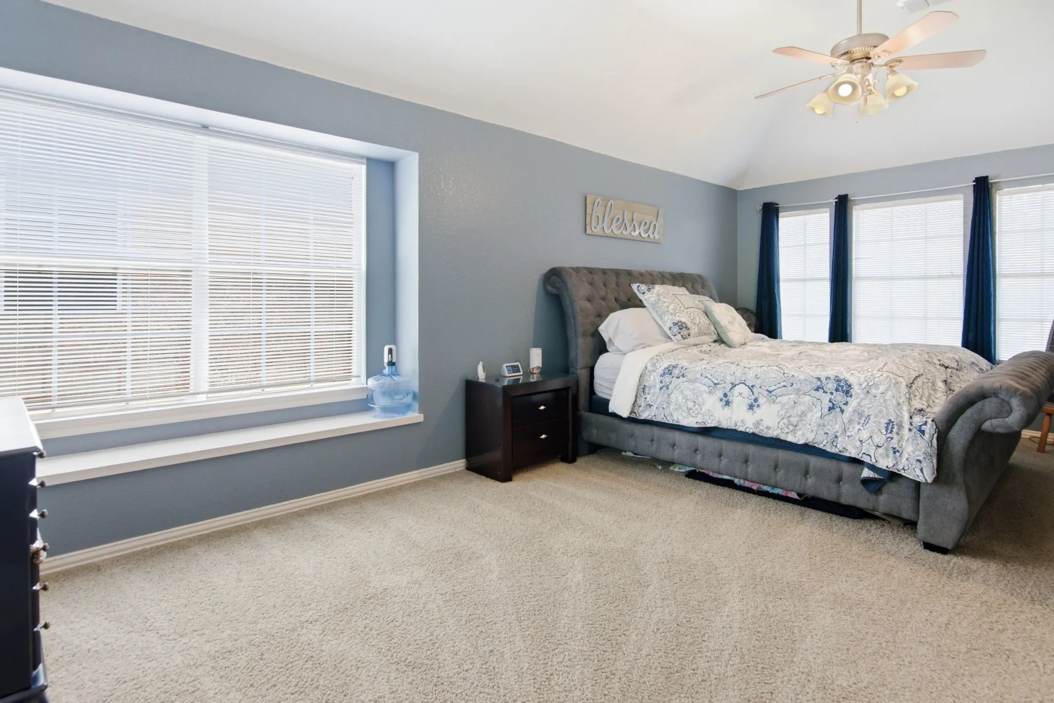 Large primary bedroom with plenty of space to arrange the way you desire.