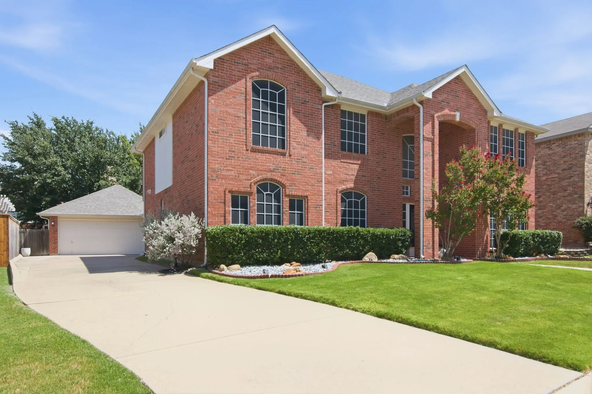 detached oversized 2 car garage, long extended driveway for plenty of private parking.