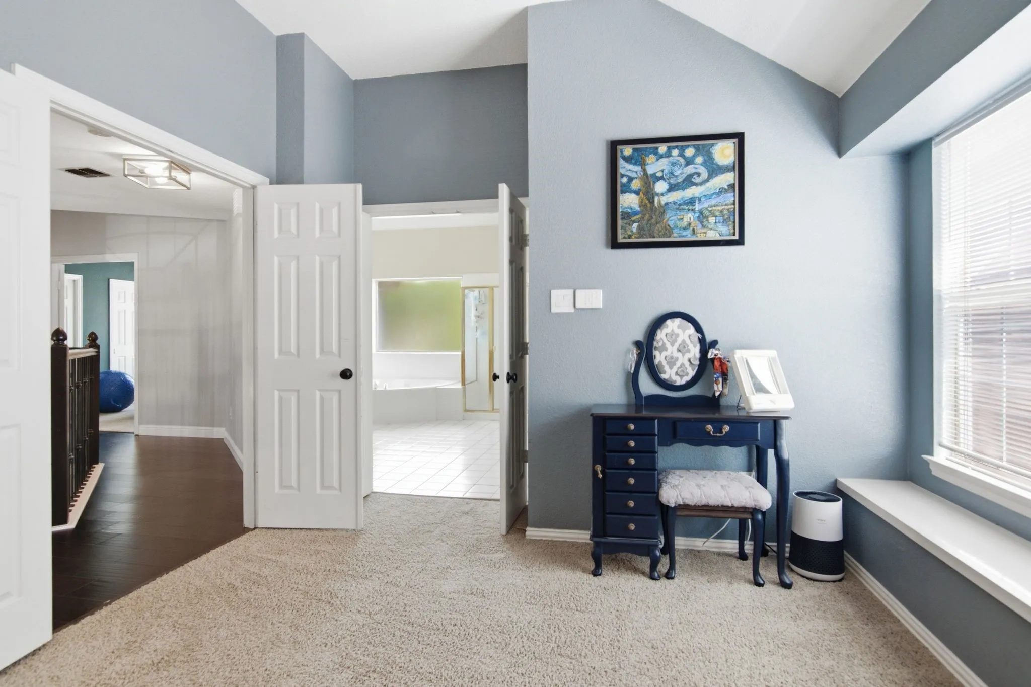 Primary bedroom features an ensuite bathroom.