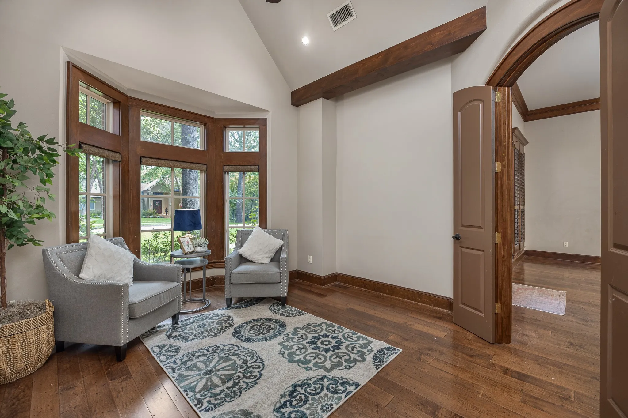 Flexible space featuring wood floor and bay window. Great for play room, second office or second living.