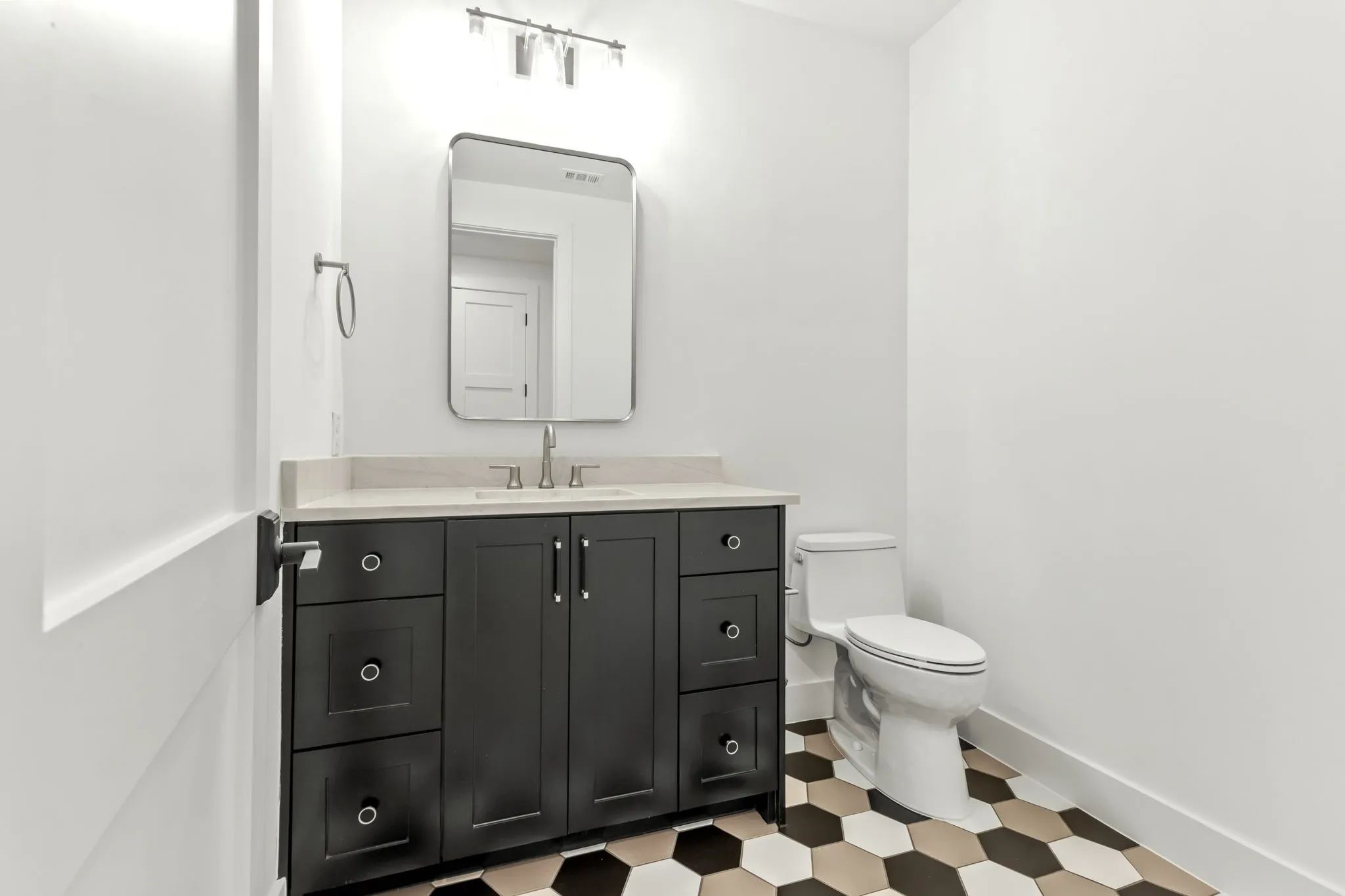 Upstairs game room powder bath