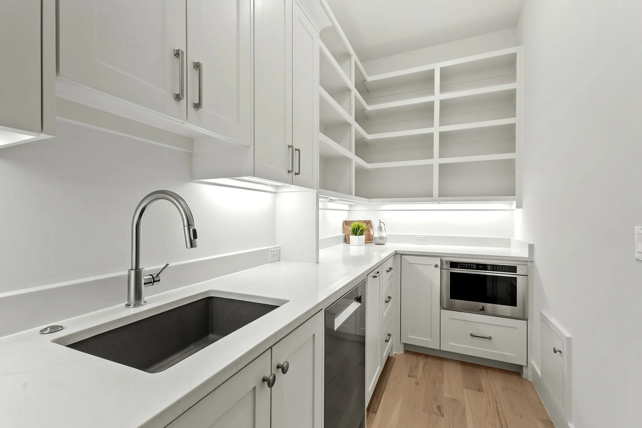 Butlers pantry sink, Bosch dishwasher and Jennair microwave