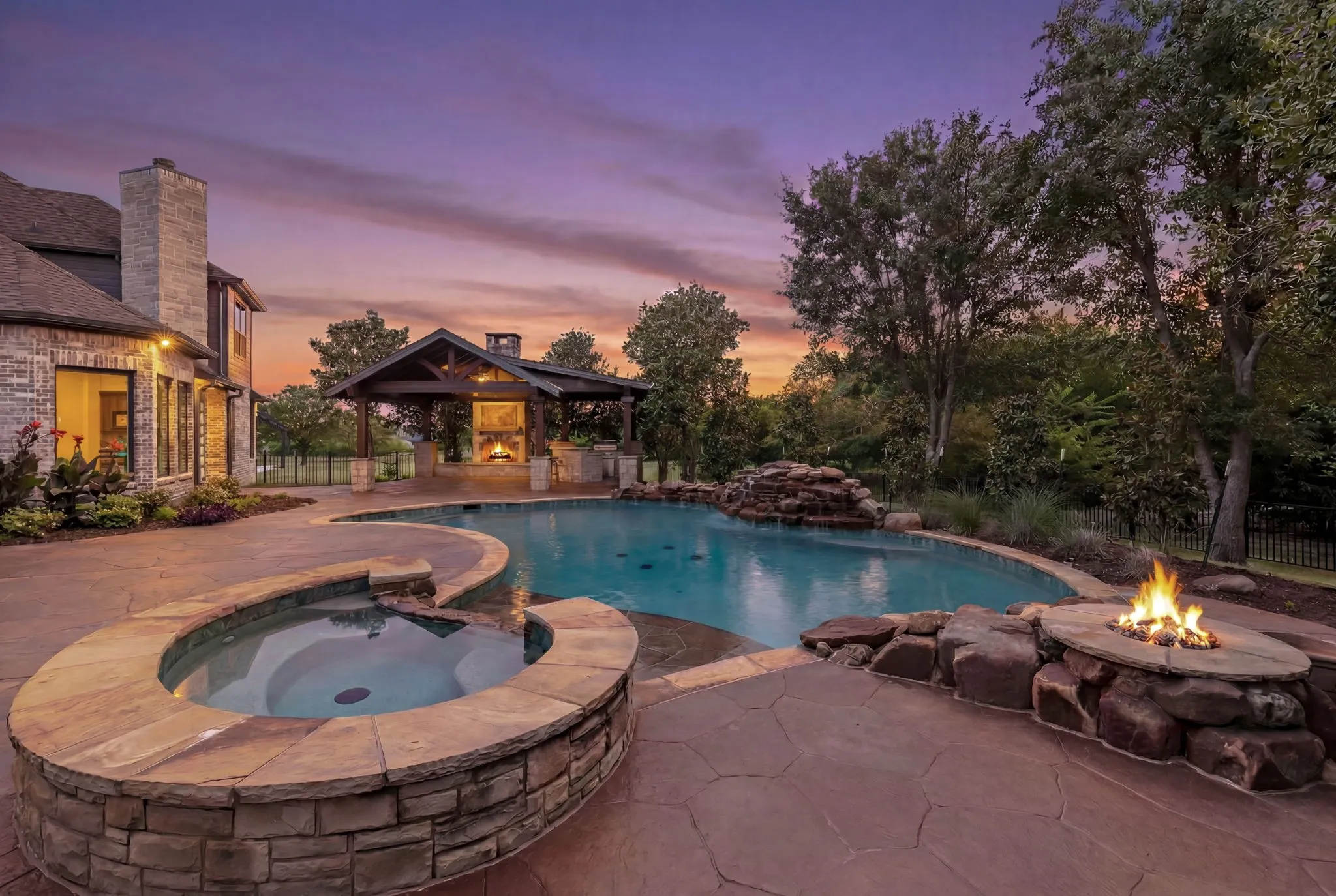 Pool spa combo with firepit and waterfall