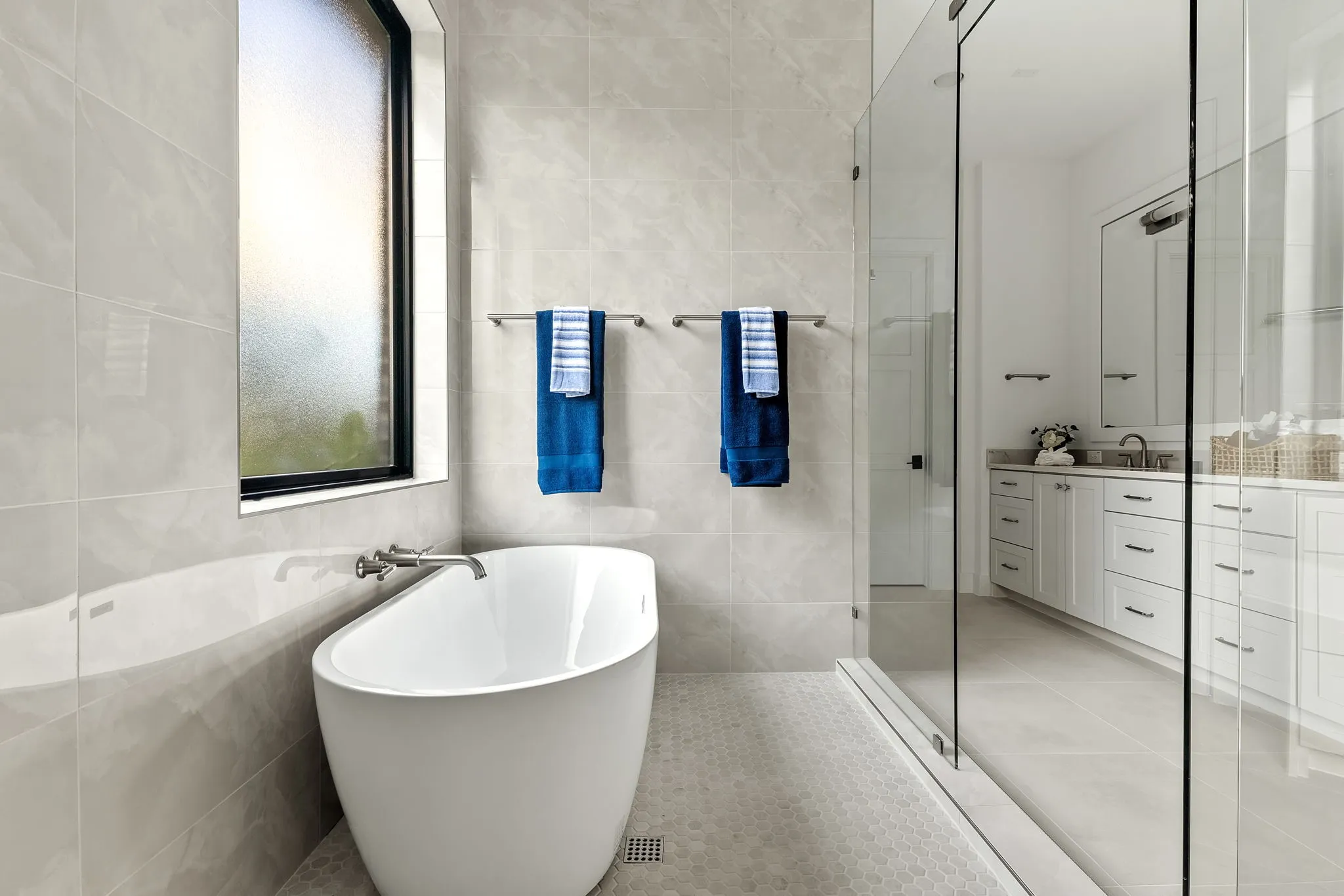 Soaking tub in shower area.