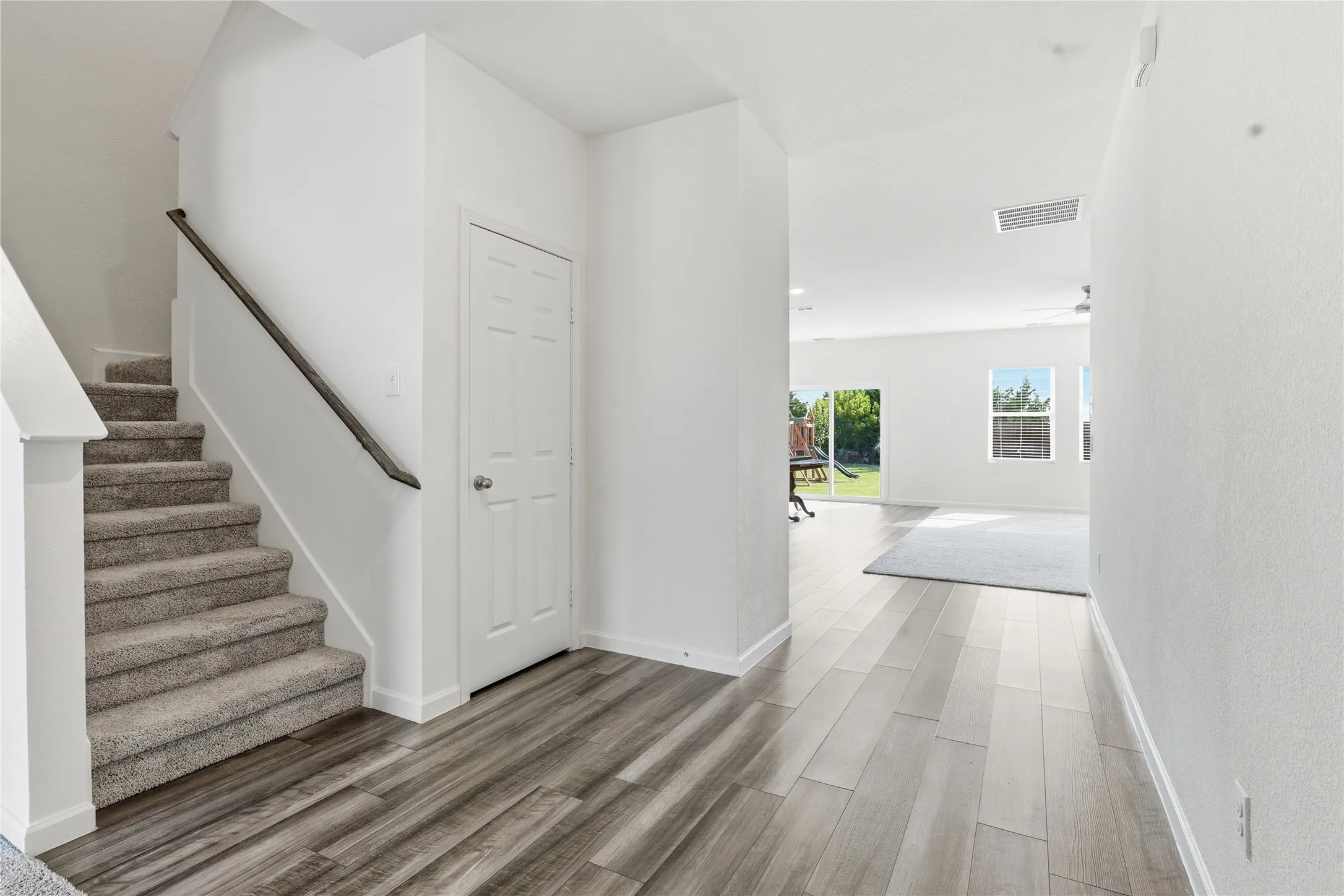 Walk in front door, bonus room to left and extended storage closet.