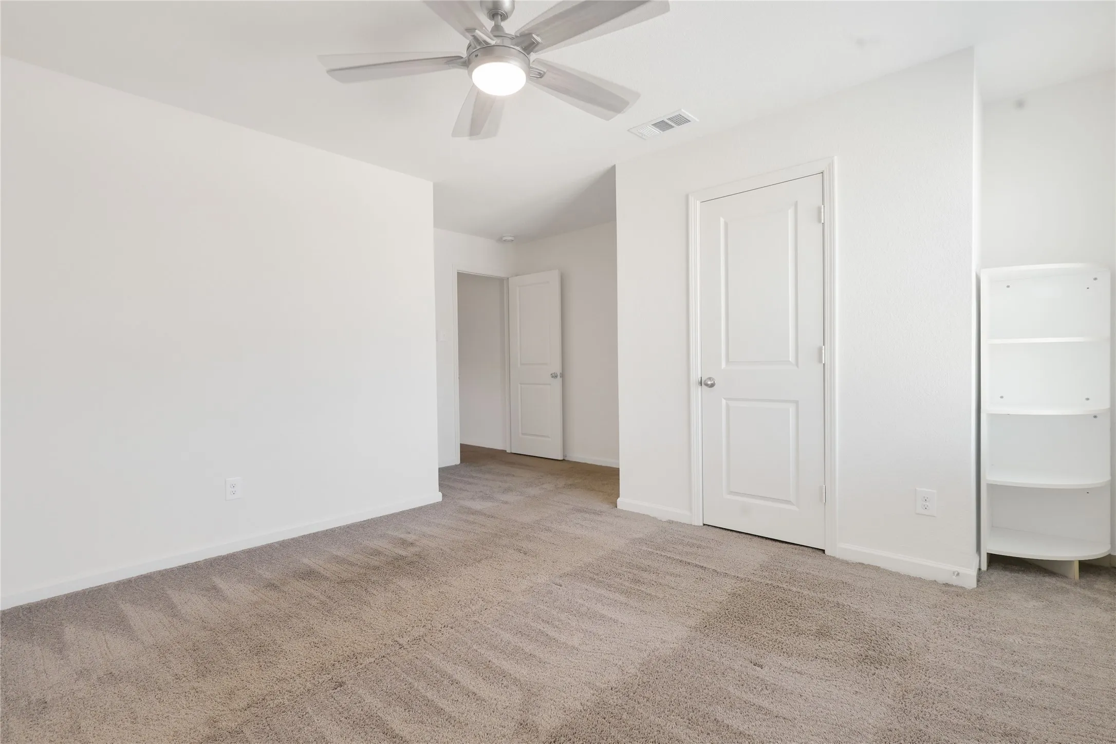 Upstairs bedroom with walk in closet