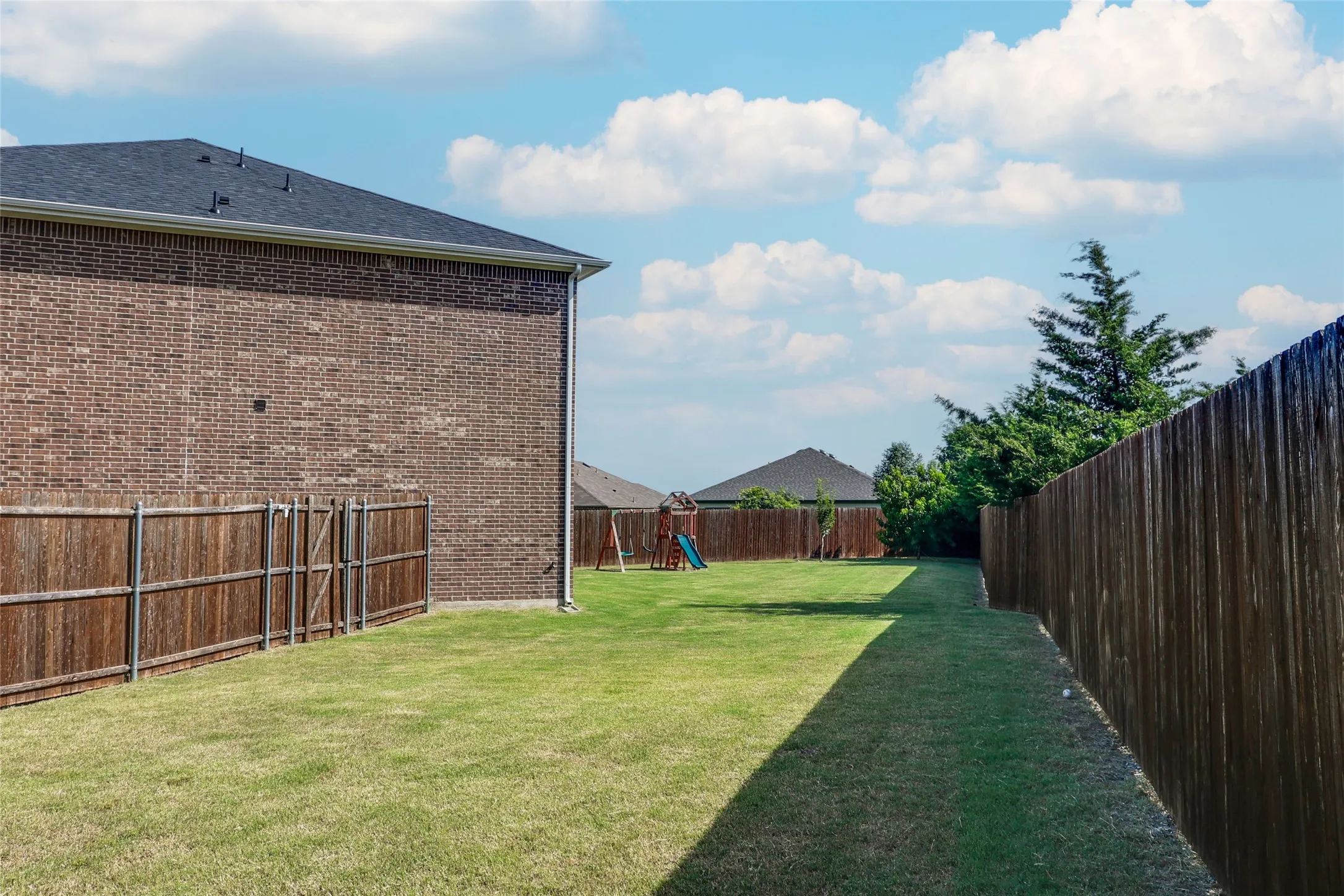 Expansive backyard featuring fruit trees and oversized lots