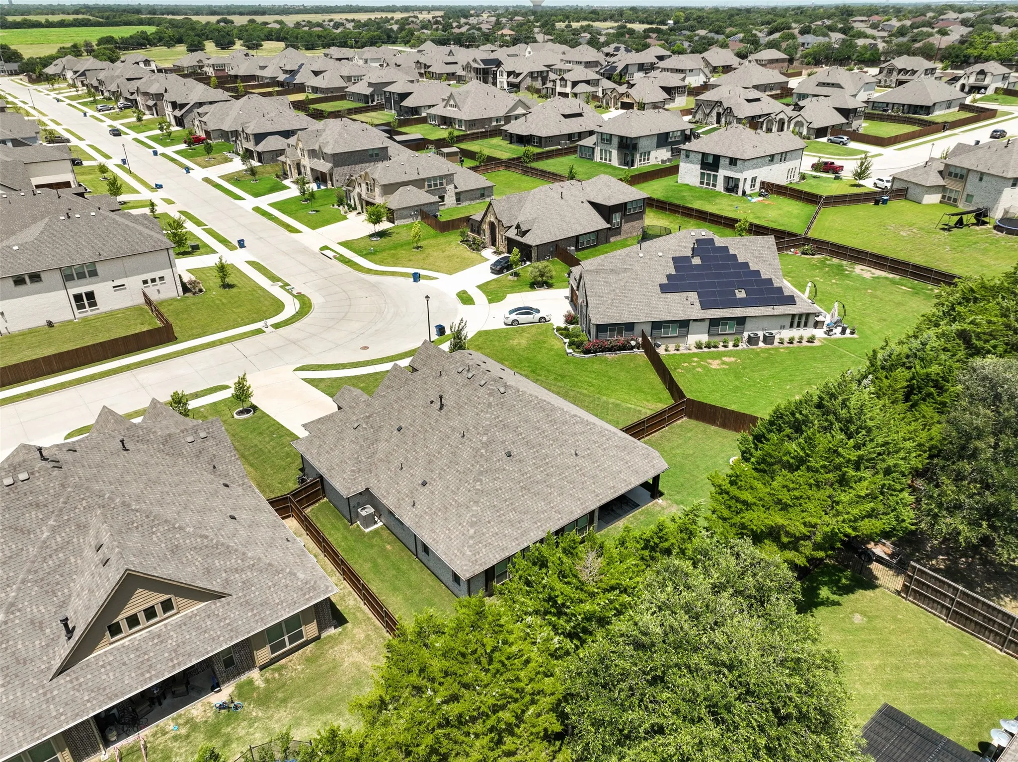 Aerial perspective showcasing a residential neighborhood with numerous single-family homes
