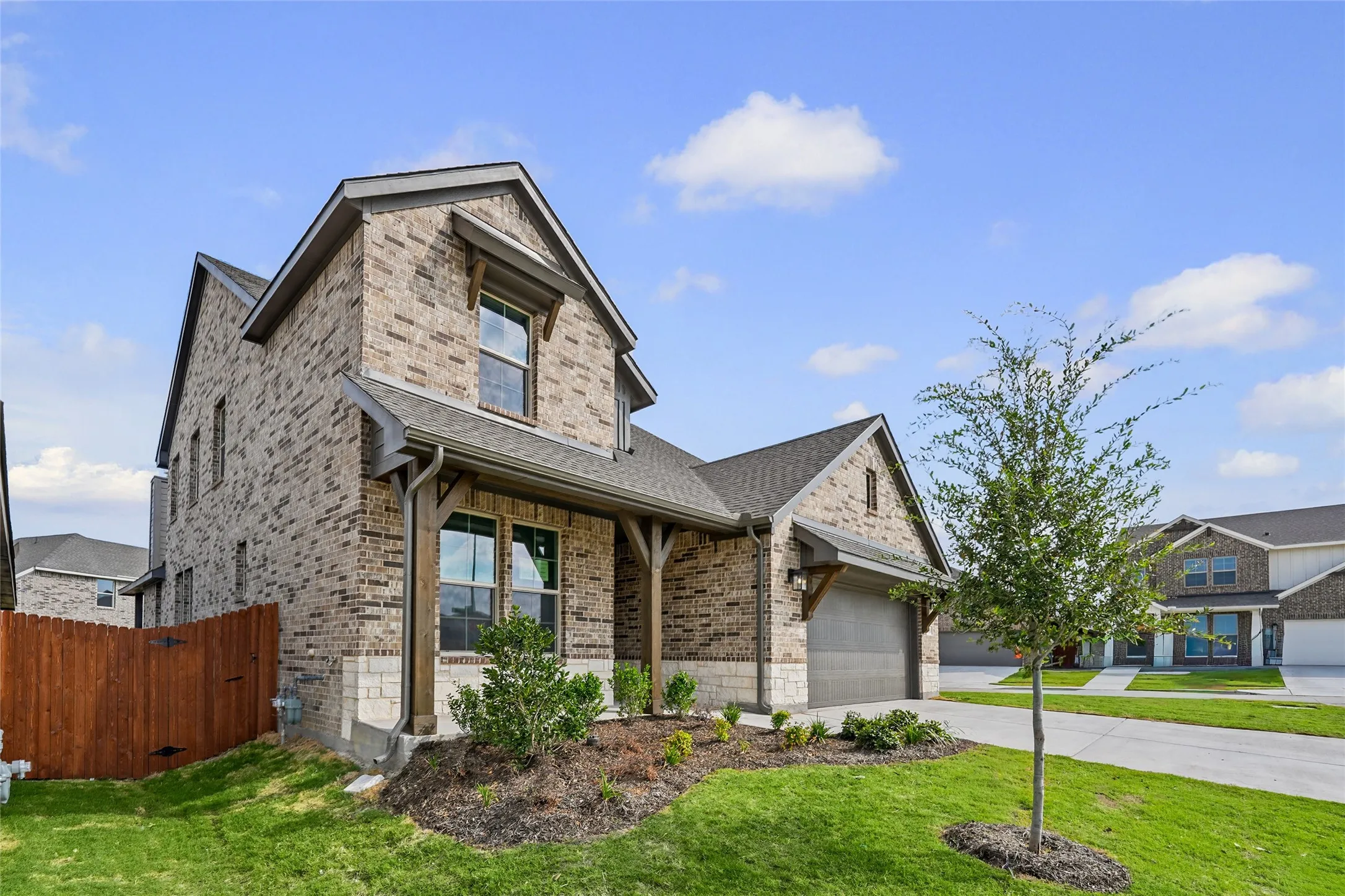Brick and stone exterior with a gabled roof