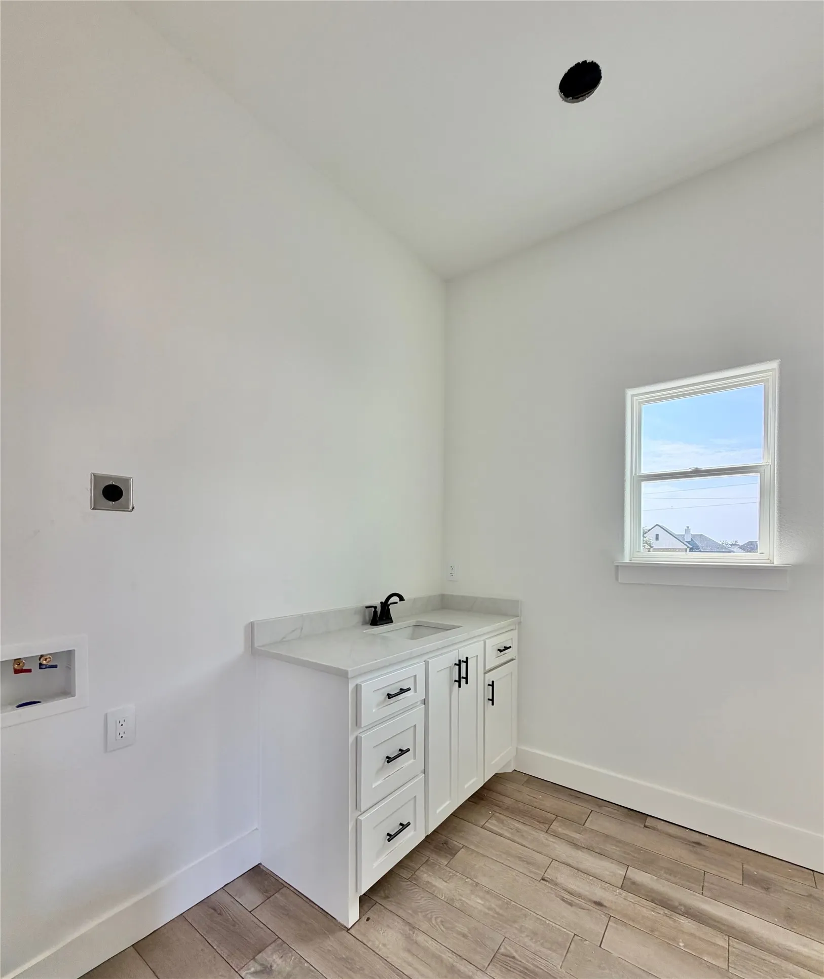 Bathroom and laundry area in ADU