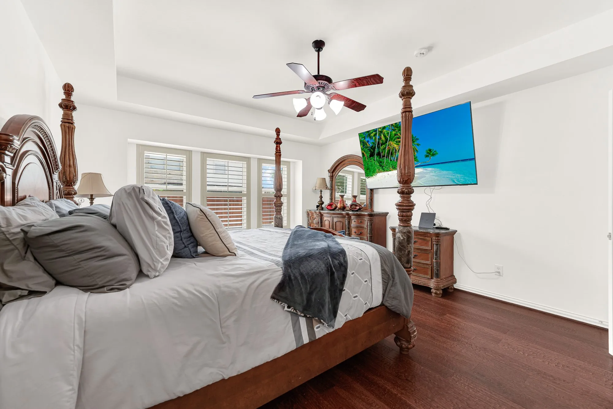 A thoughtfully designed layout provides generous space for large furnishings while maintaining an open, airy feel throughout the room. End your evenings with a favorite book or movie in a bedroom that feels both comfortable and relaxing.
