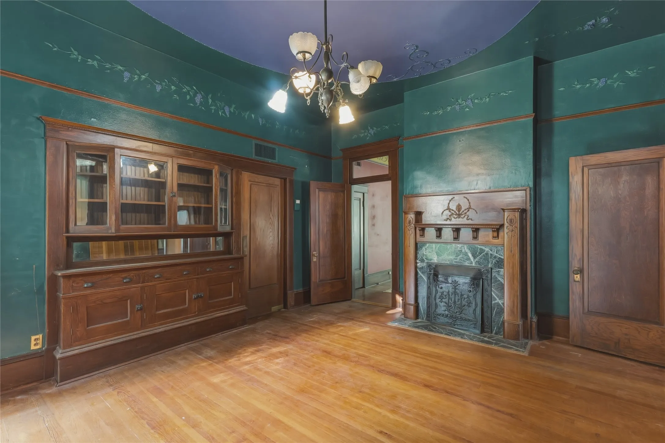 Dining space right off of the butlers pantry featuring gorgeous built ins and beautiful fireplace