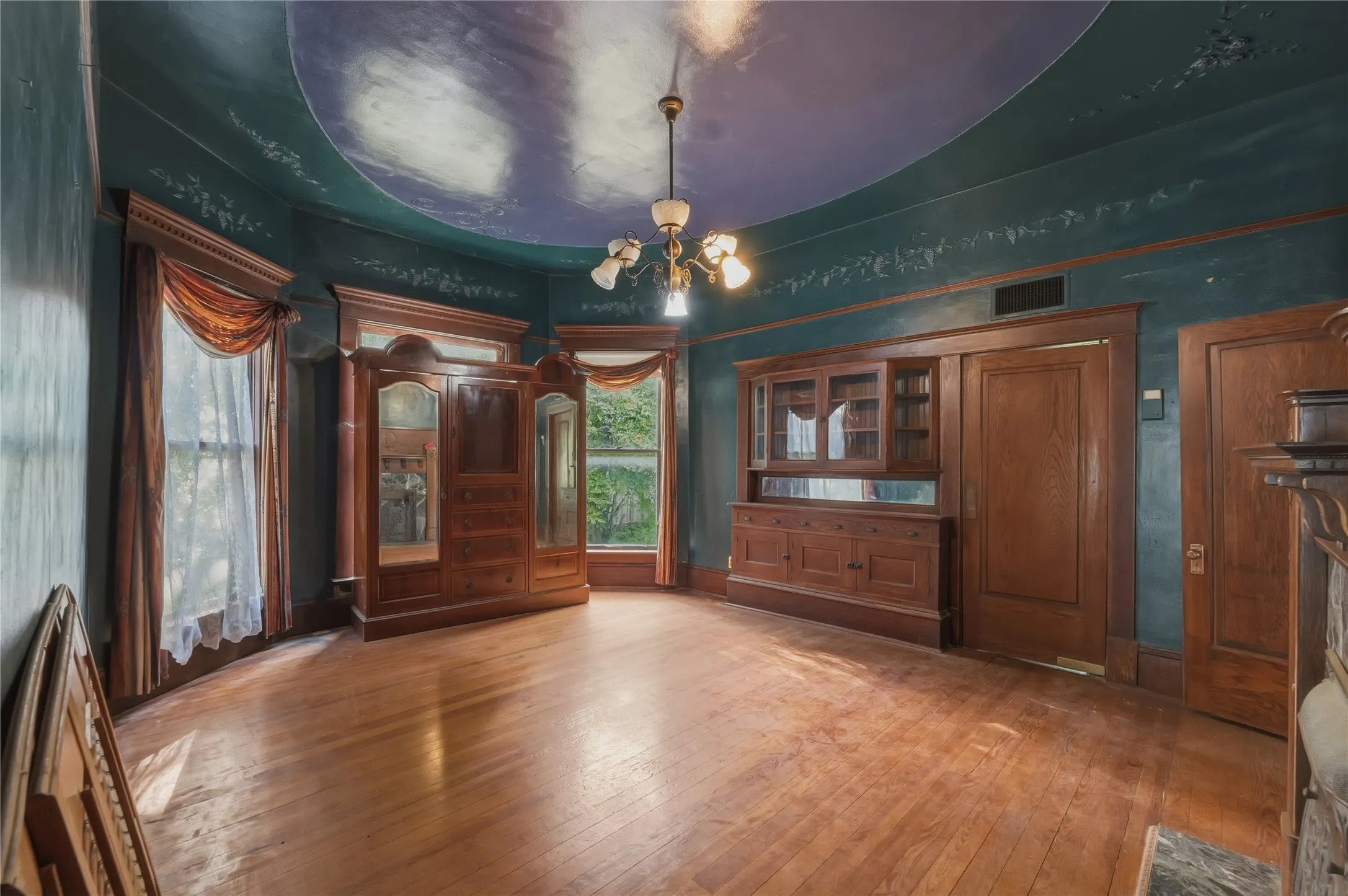 Dining space right off of the butlers pantry featuring gorgeous built ins and beautiful fireplace