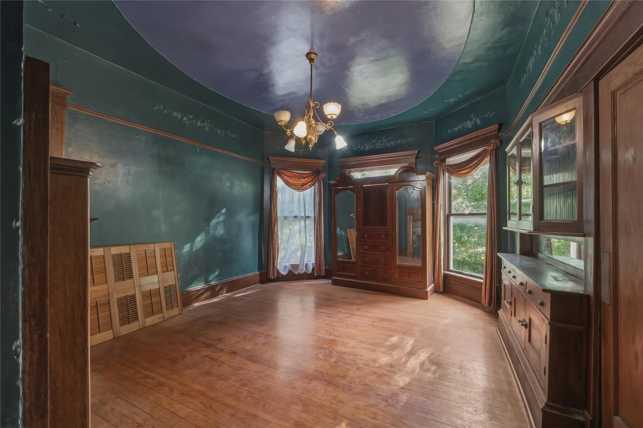 Dining space right off of the butlers pantry featuring gorgeous built ins and beautiful fireplace