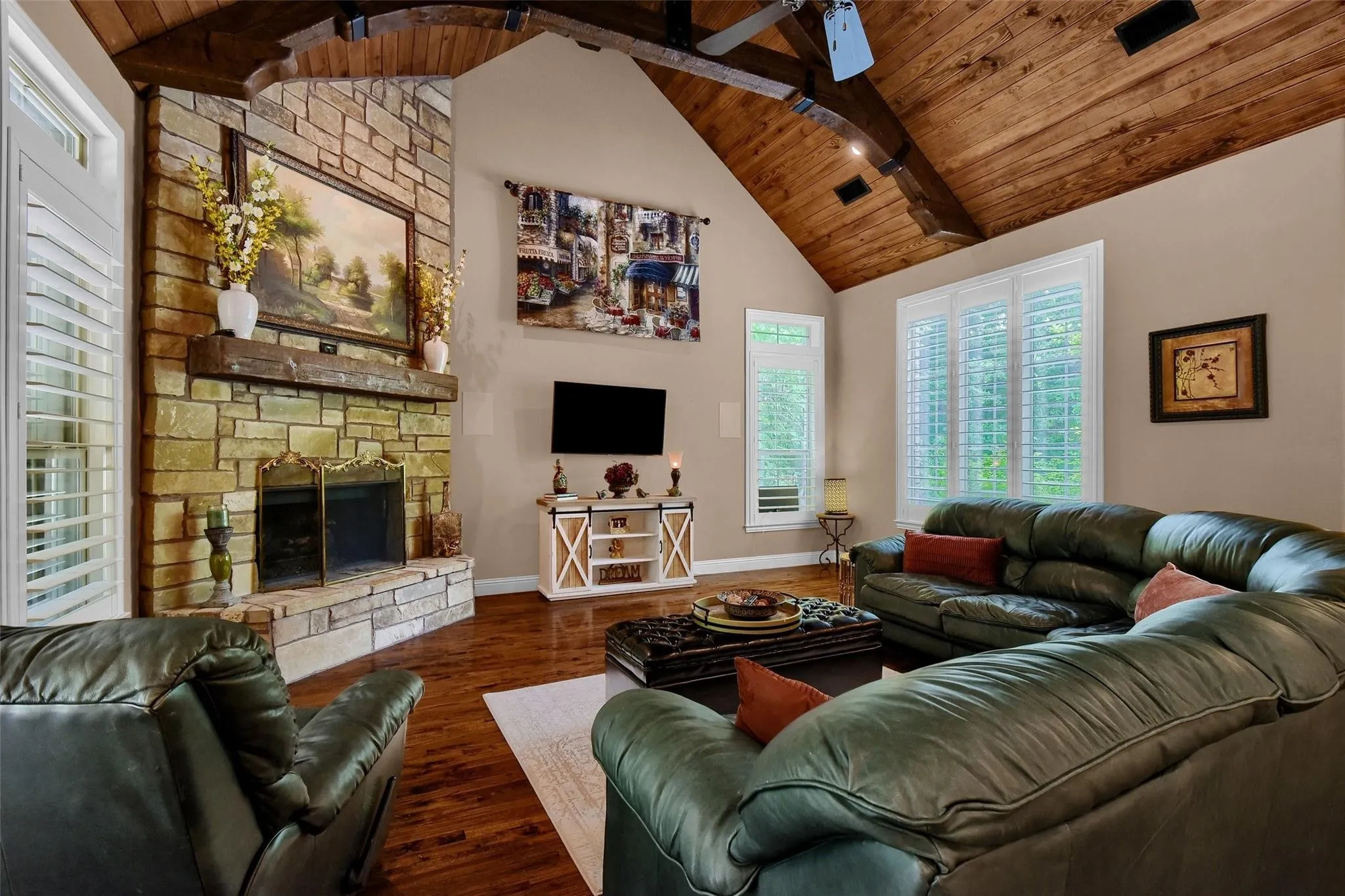Vaulted wood-plank ceiling with exposed beams