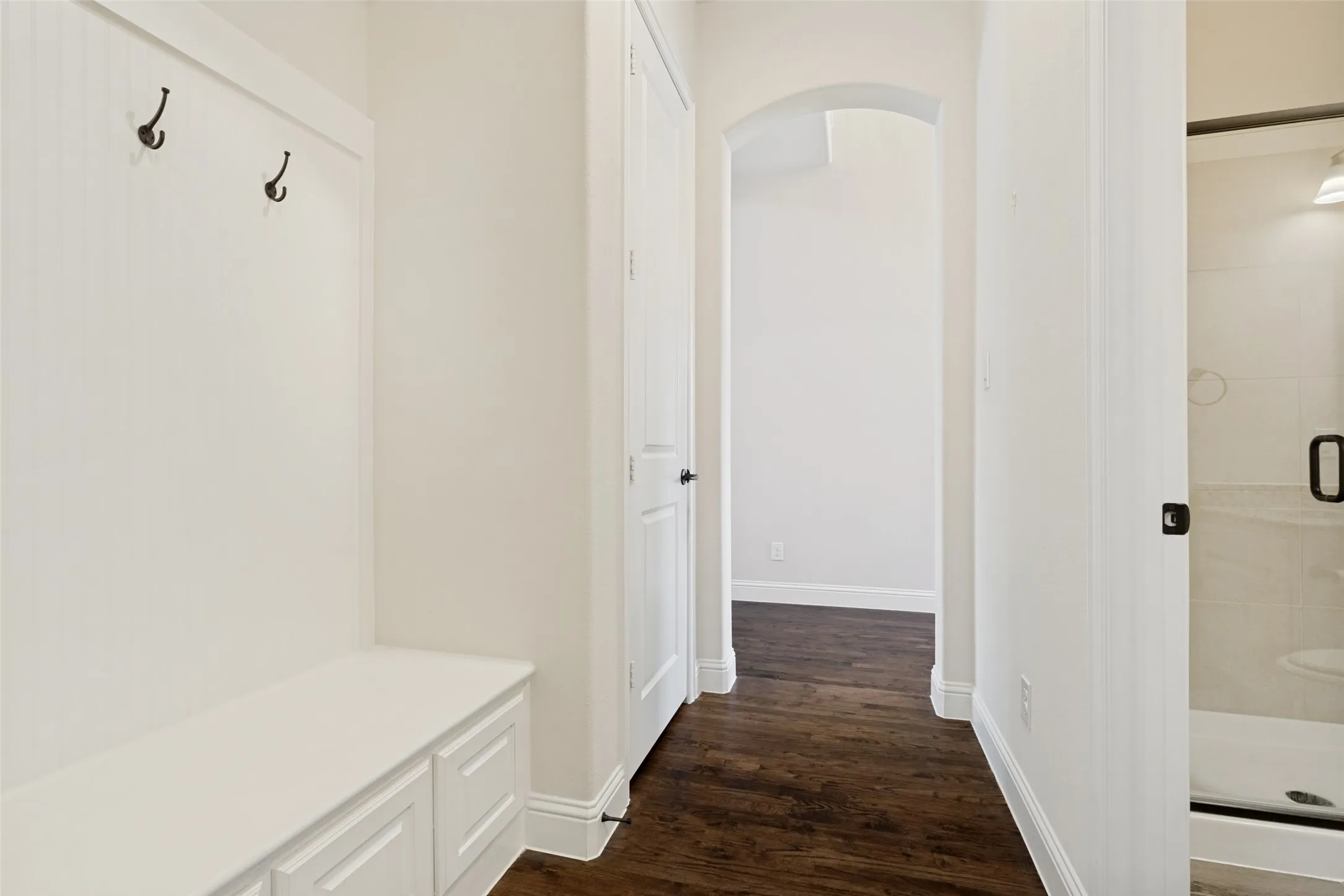 Mud Hallway with Built in Coat Hooks & Bench