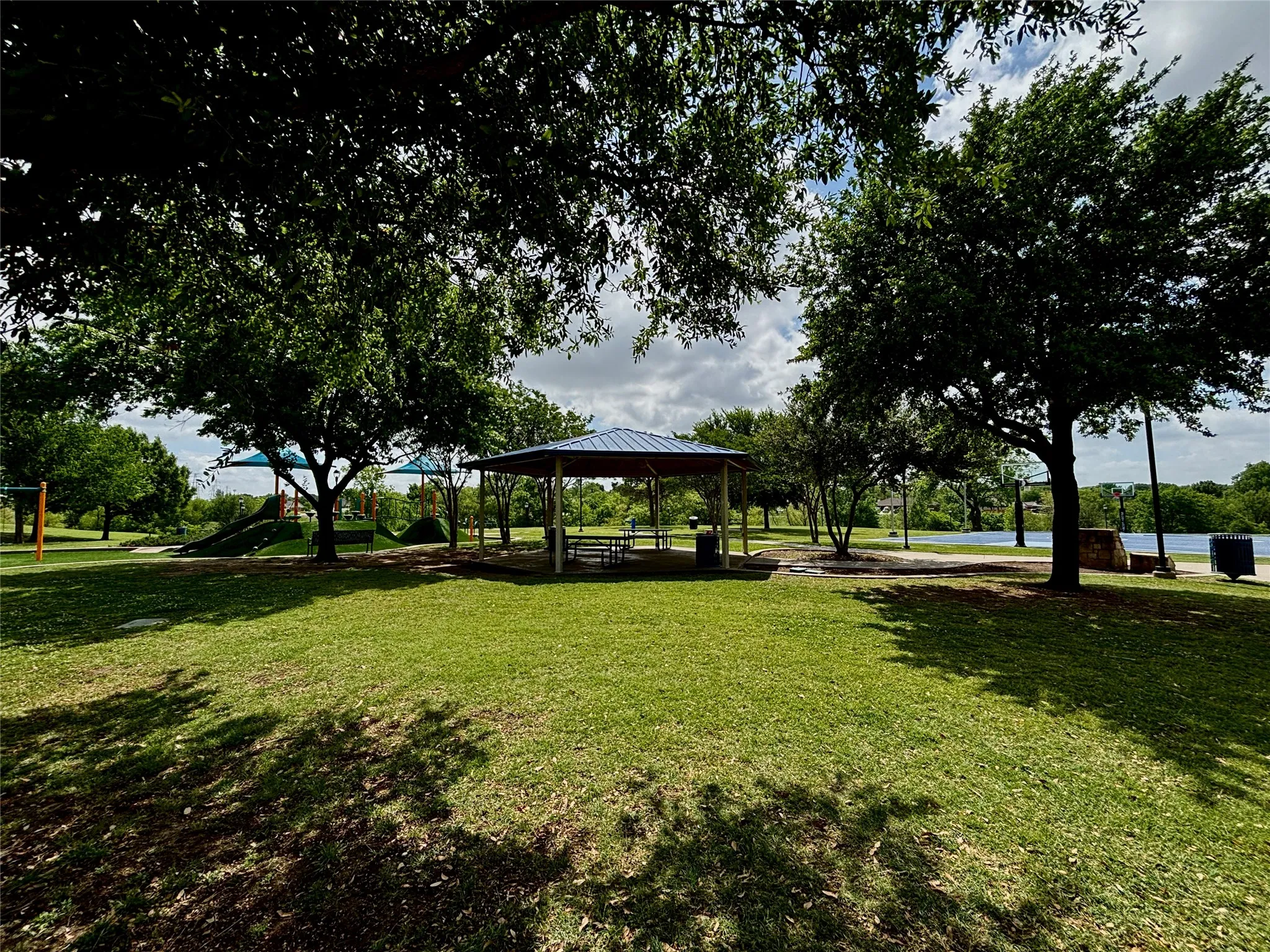 Walking distance is a playground, basketball court, and walking trails.