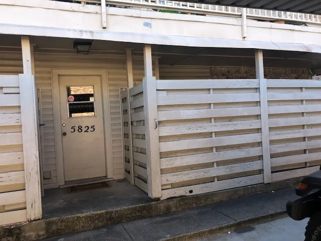 Rear entrance to building and laundry