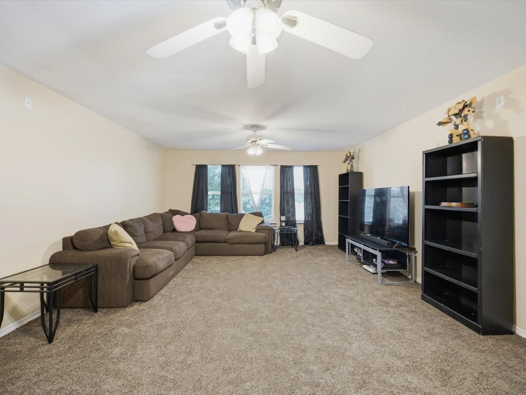 Spacious Game room featuring neutral wall tones and plush carpeting