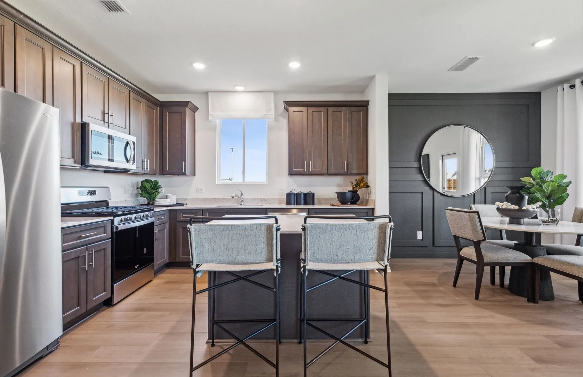 *Model Representation -Large island overlooking gathering room and dining areas