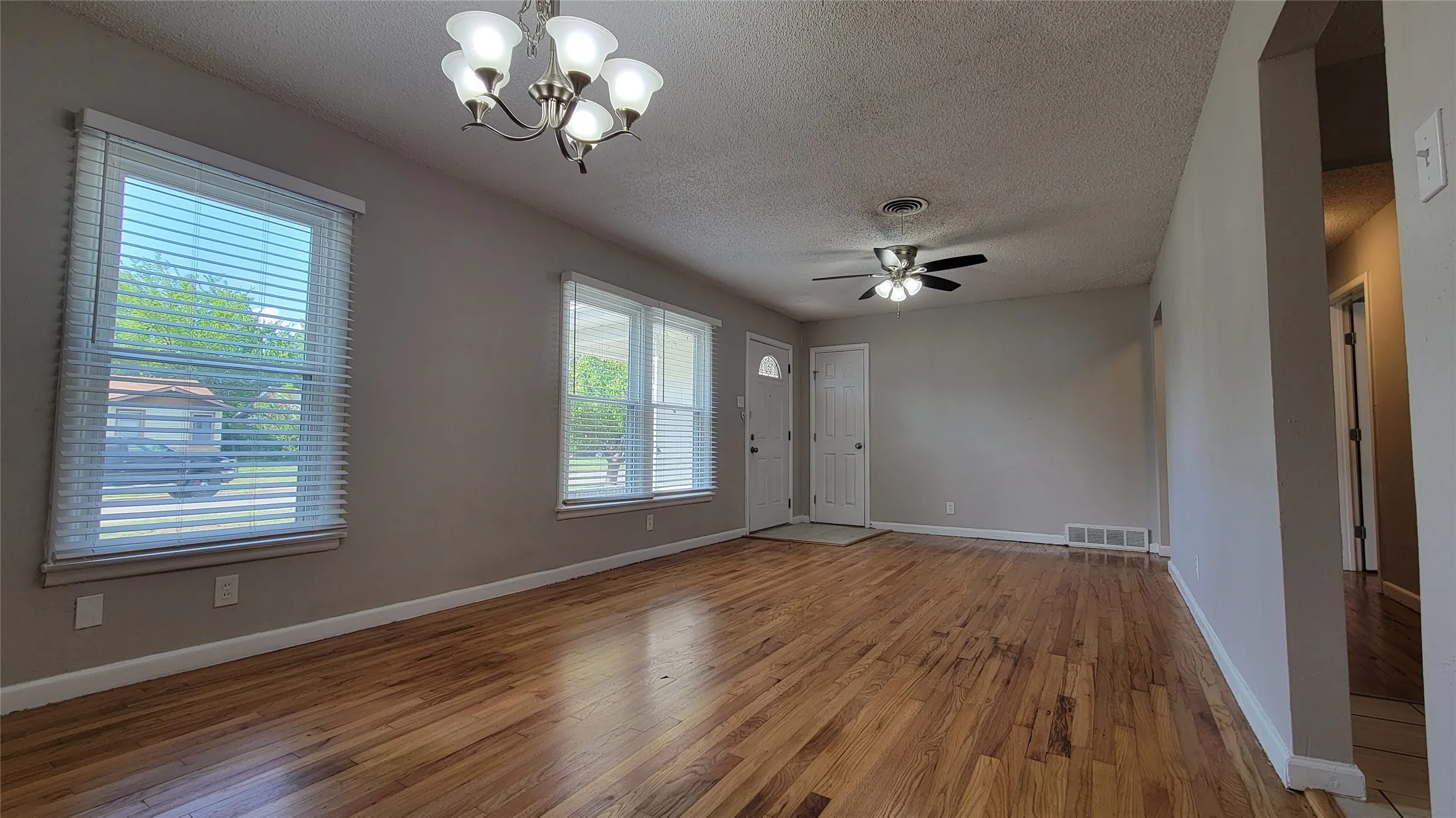 Living and dining off the entry and the kitchen