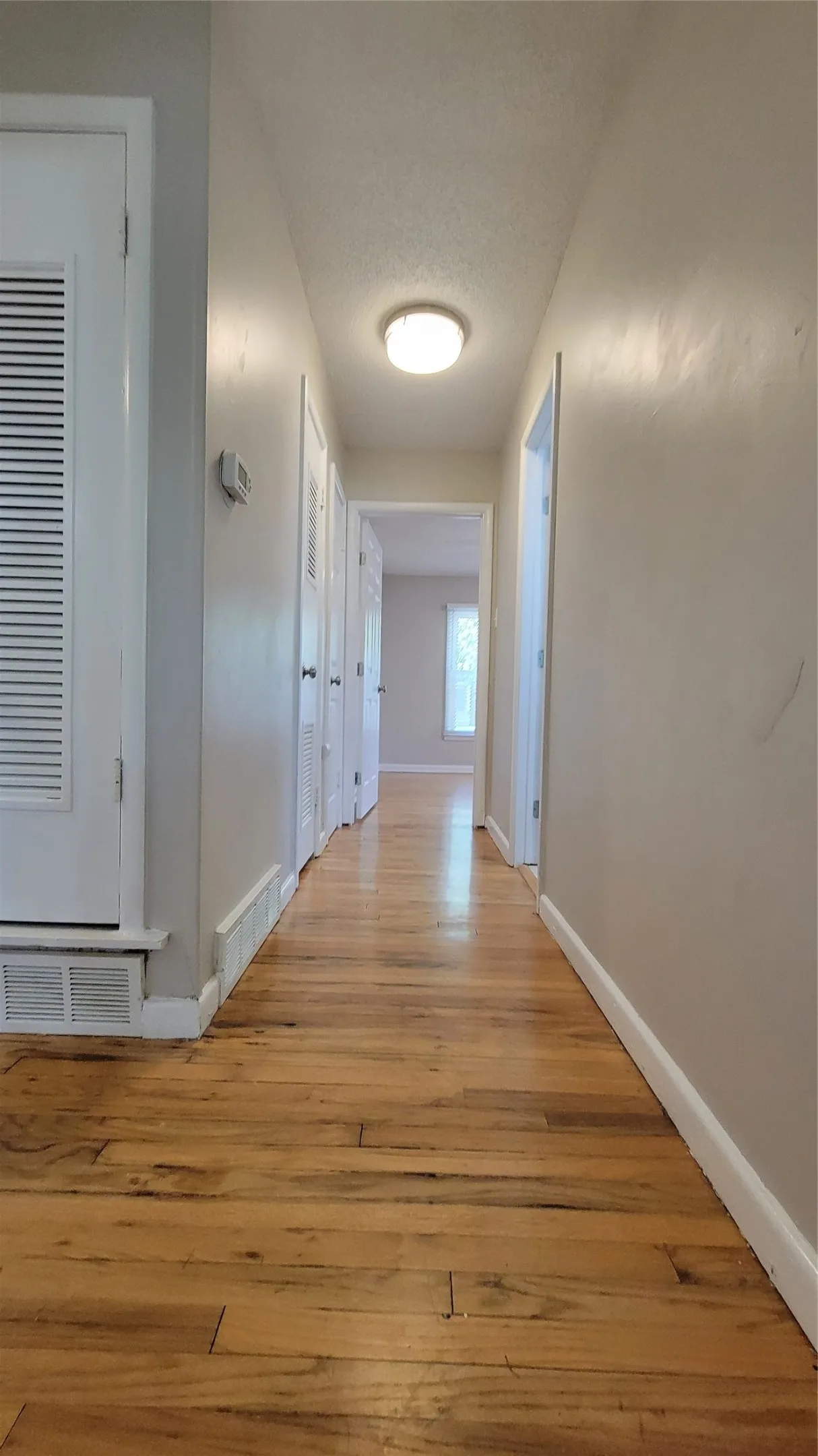 Hallway to front bedroom