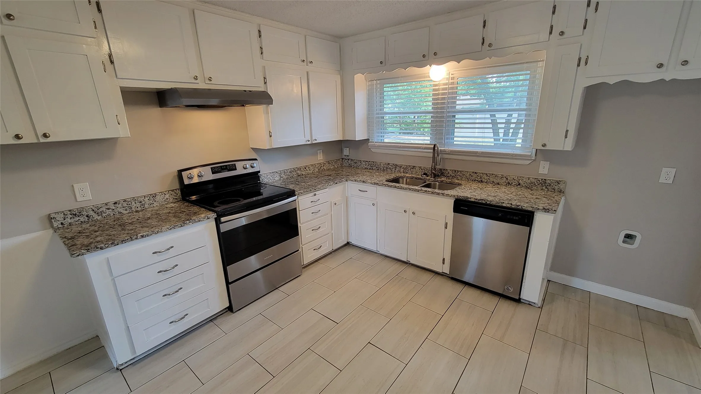 Kitchen with stainless steel appliances