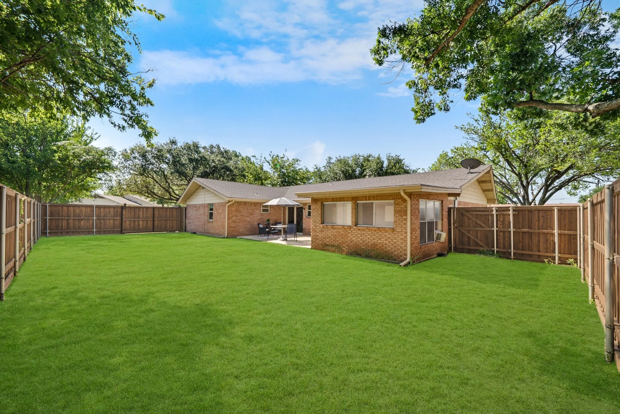 Corner lot, private gated yard with patio.
