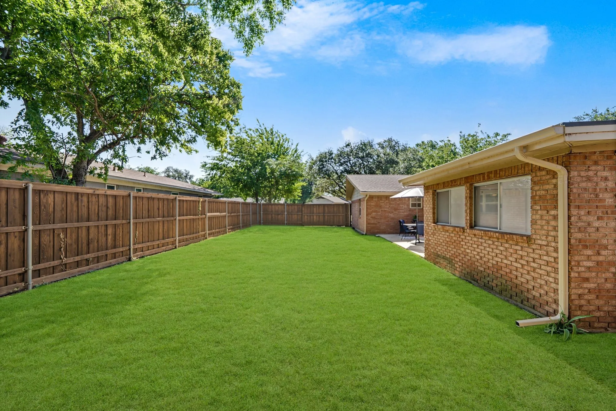 Great private yard!  Recently installed fencing with large slider gate along the street