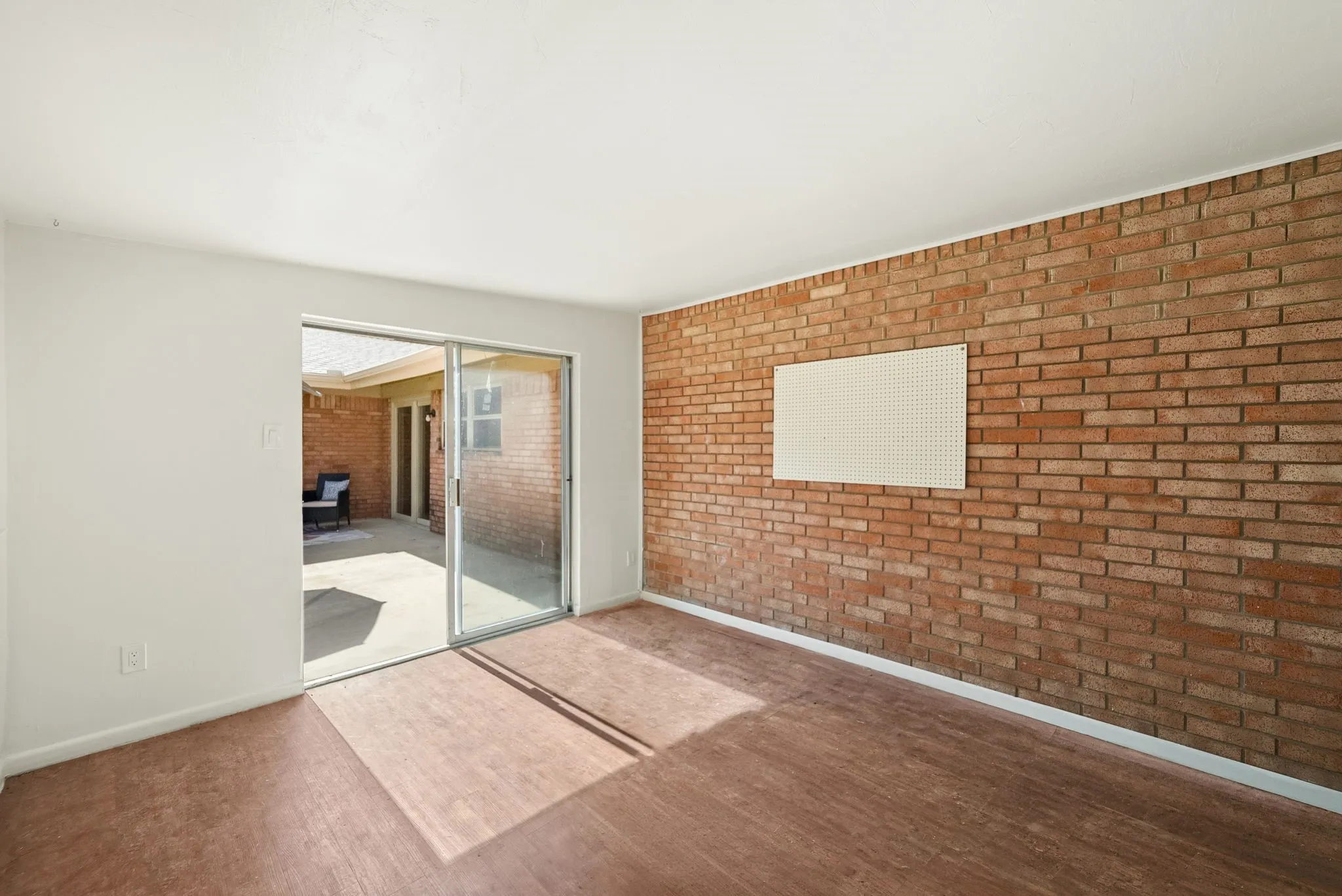 Bonus space.  Not included in square footage.  Greenhouse? storage? Craft area?  Just off the patio