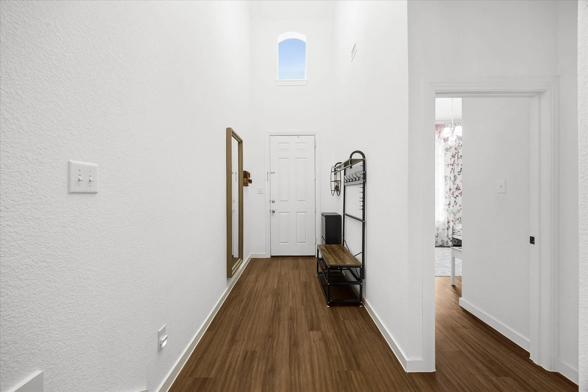 Impressive entry includes towering ceilings