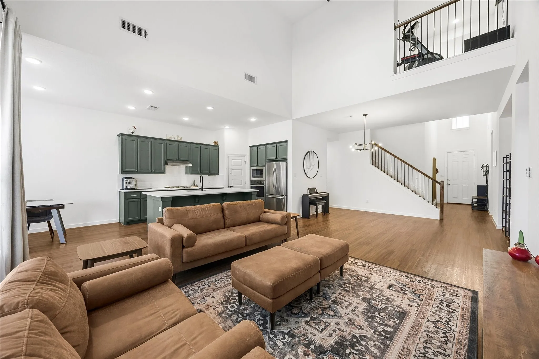 Family room overlooks kitchen and breakfast area