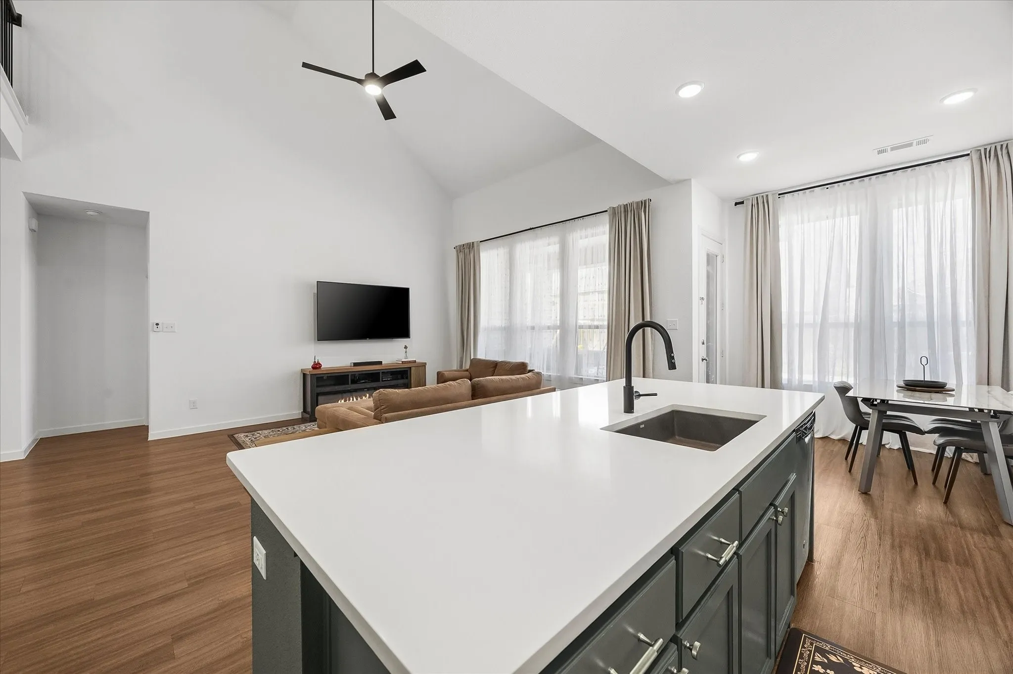 Open floor plan features kitchen opening onto family room and breakfast area