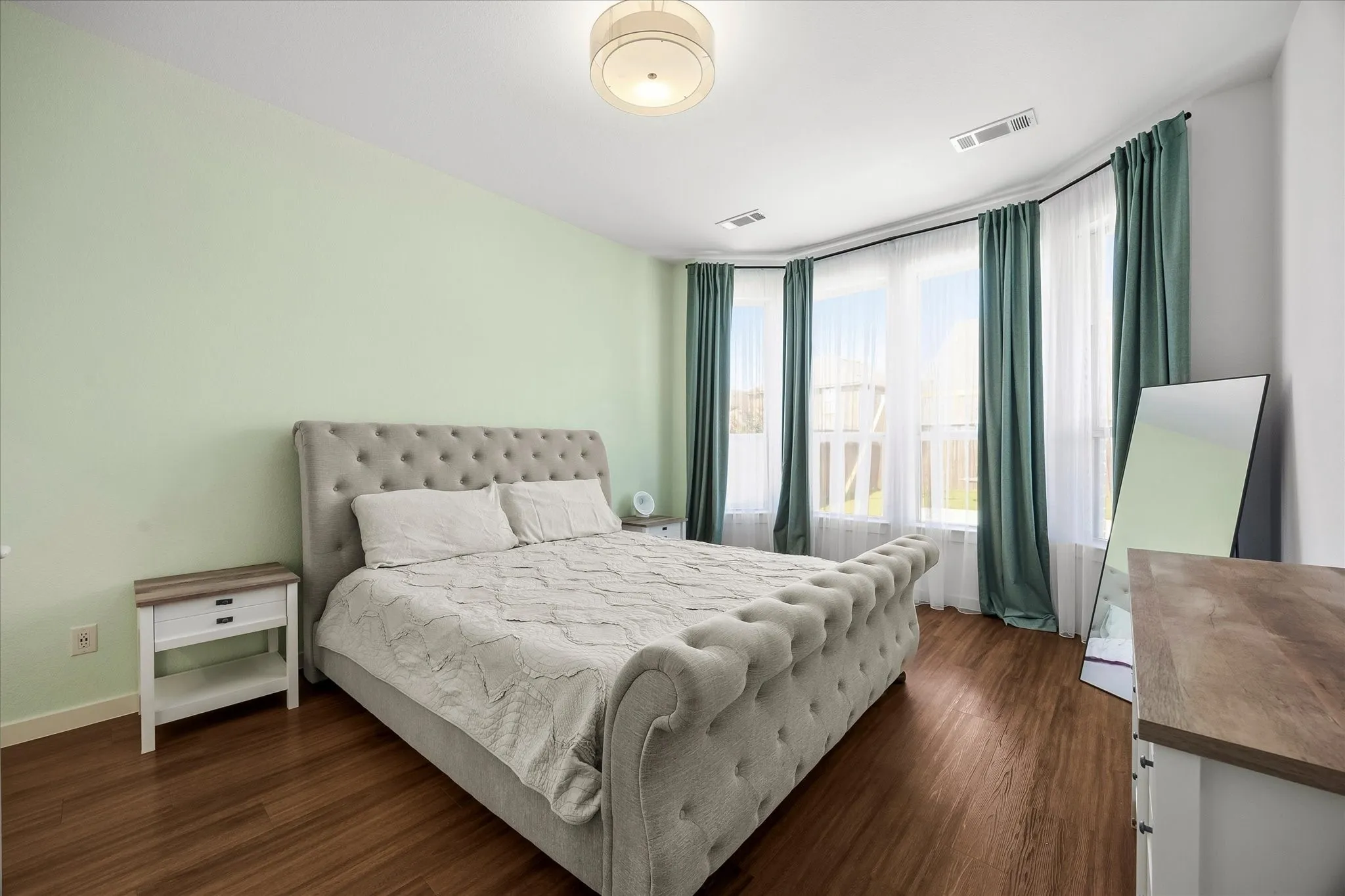 Beautifully detailed master bedroom opens onto master bath