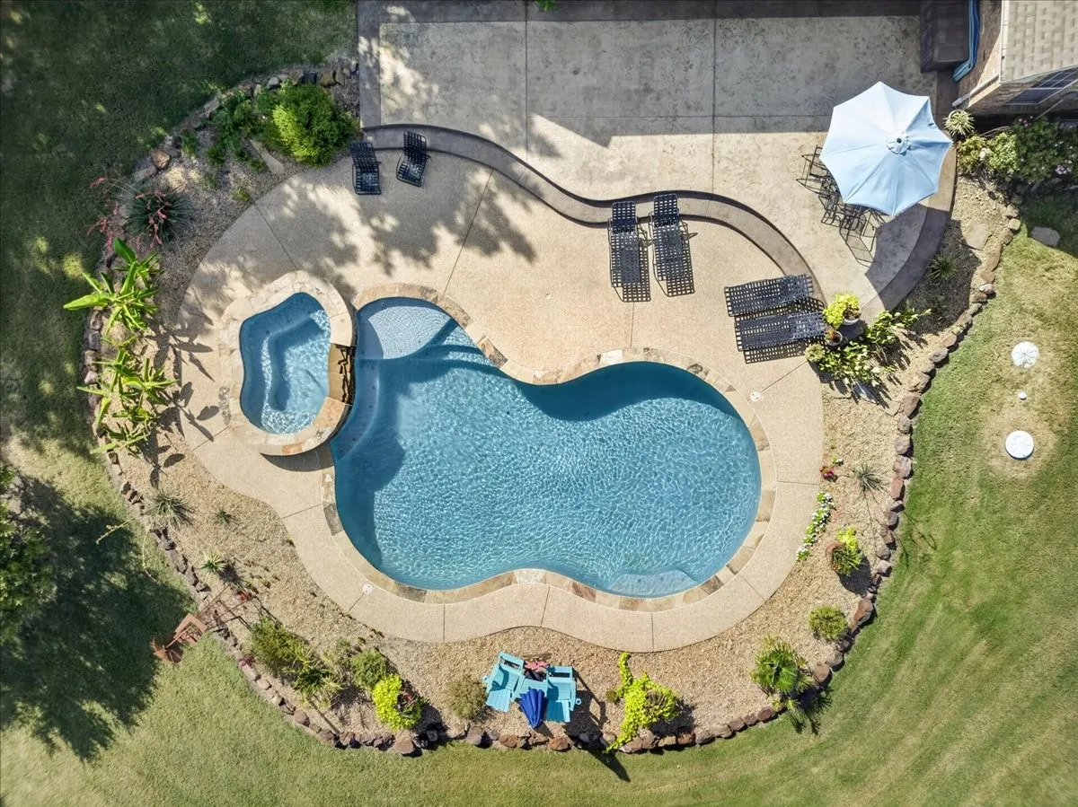 Pool and spa combo with an extra large deck