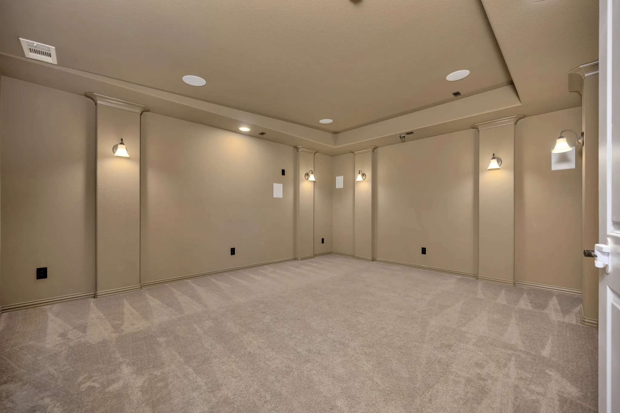 Media room with surround sound speakers