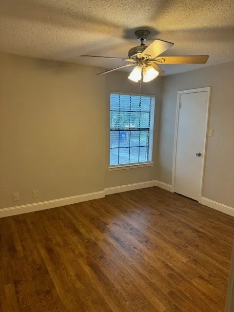 Bedroom with engineered Flooring, light, bright and plenty of closet space