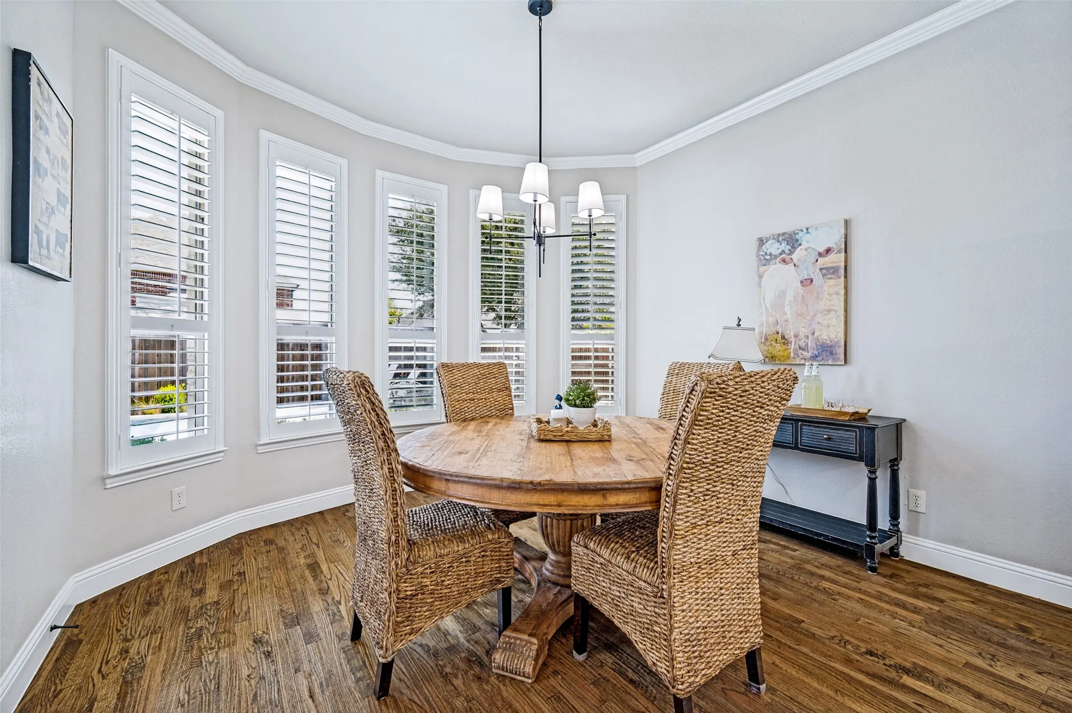 Kitchen dining area with window views of the backyard.